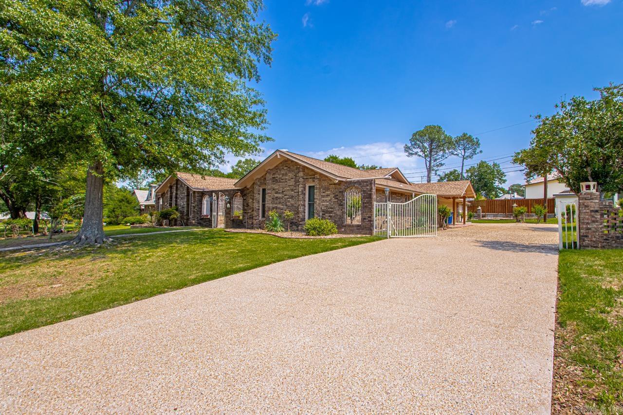 Very nice home in Shady Valley Subdivision. New Architectural Roof in 2023. New  paint in 2025 on exterior of home. 3 bedrooms, 2 1/2 bath. Large formal dinning and living room combo. large Den with brick fireplace. Eat-in kitchen with wet bar. Huge covered patio great for cookouts. . Extra wide driveway with plenty of parking with sideload 2 car garage with storage building next to it and another storage building in back yard. . Very large lot for outside activities. Come see this home you will be glad you did. The 2 chandelier's in the formal living room and formal dinning room do not convey with the property. " See Agent Remarks"