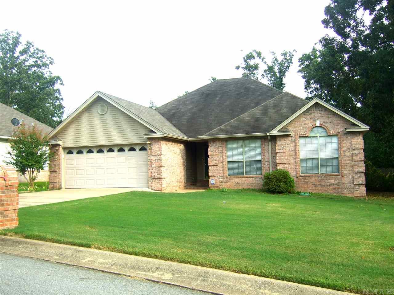Awesome 3 BR 2 Bath split plan home on level lot on quiet cul-de-sac. No carpet! All tile & beautiful upscale laminate. Gas log fireplace. Stainless steel double ovens, microwave, & dishwasher. Large dining area in kitchen. Master bath has whirlpool, separate shower, & 2 large closets. Laundry room has cabinets over W&D, shelves, & ironing board in the wall!!! Garage has storage/workshop area. Room for double gate to backyard. Covered back porch & patio in huge, fairly private back yard.  See Agent Remarks.