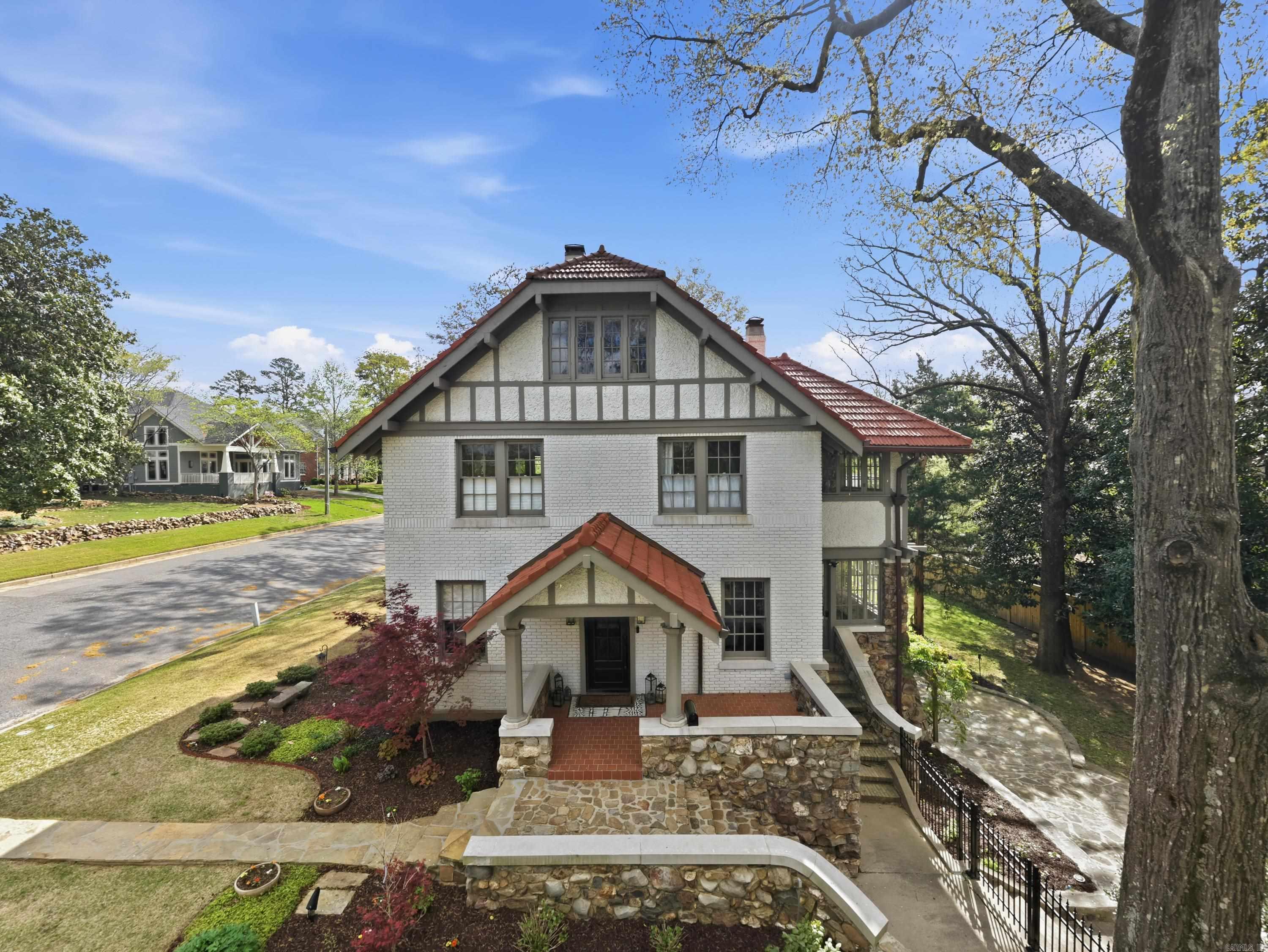 Extraordinary home in an unparalleled location at the corner of Hill Road and Pine. This meticulously restored and rebuilt residence sits on a rare and expansive double lot.  The home's tile roof, completely restored with new decking, ice/water shield and copper gutters, flashing and downspouts, adds timeless appeal to the exterior. Every detail has been carefully considered, with all new landscaping and decks creating inviting spaces for outdoor enjoyment. The property also features a putting green and an iron/privacy fence, perfect for both relaxation and recreation.  Inside, no aspect has been overlooked. Gorgeous real hardwood floors throughout.  Chef’s kitchen with high end appliances with copper and brass accents.  Huge bedrooms with walk-in closets were thoughtfully designed. Downstairs greatroom / 4th bedroom with ensuite spa bathroom with steam shower Home boasts new electrical, plumbing, insulation.  An encapsulated crawl space adds energy efficiency.  Beautiful flagstone walkways lead you through the property.  This meticulously renovated home offers a blend of modern upgrades and classic design in a truly exceptional location.  COME SEE!!!