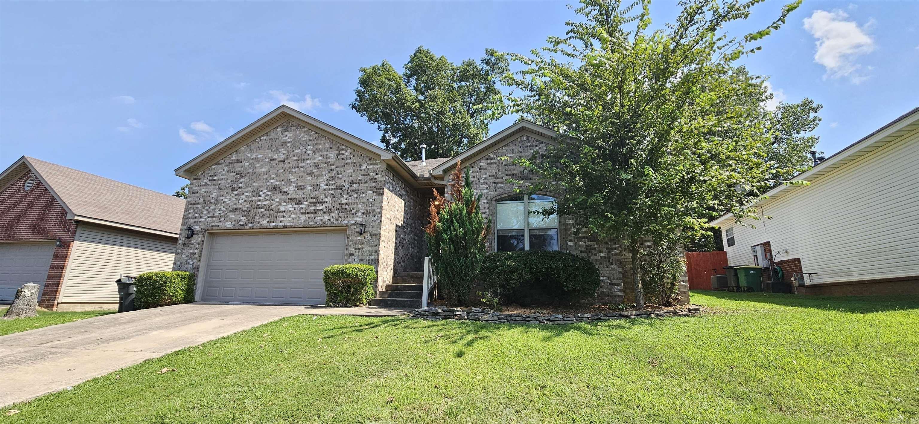 Updated 3 bedroom 2 bathroom home with New Carpet and New Paint. Kitchen appliances include fridge, range, dishwasher, disposal and microwave. Home also includes a pantry, dining area, fireplace, separate utility room, built in vanity in 1 bedroom, fenced yard, and 2 car garage. Pets may be considered.