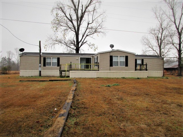 Don't miss this home in Watson Chapel area.  This home is a 16x76 mobile home with a room added on that is not included in sf.  It has 2 front decks, 3 bedrooms, 2 baths, new flooring, and new paint, split floor plan with large master bedroom. This home sits on 1 acre.  *Taxes are without homestead*  **Agents see Remarks**.