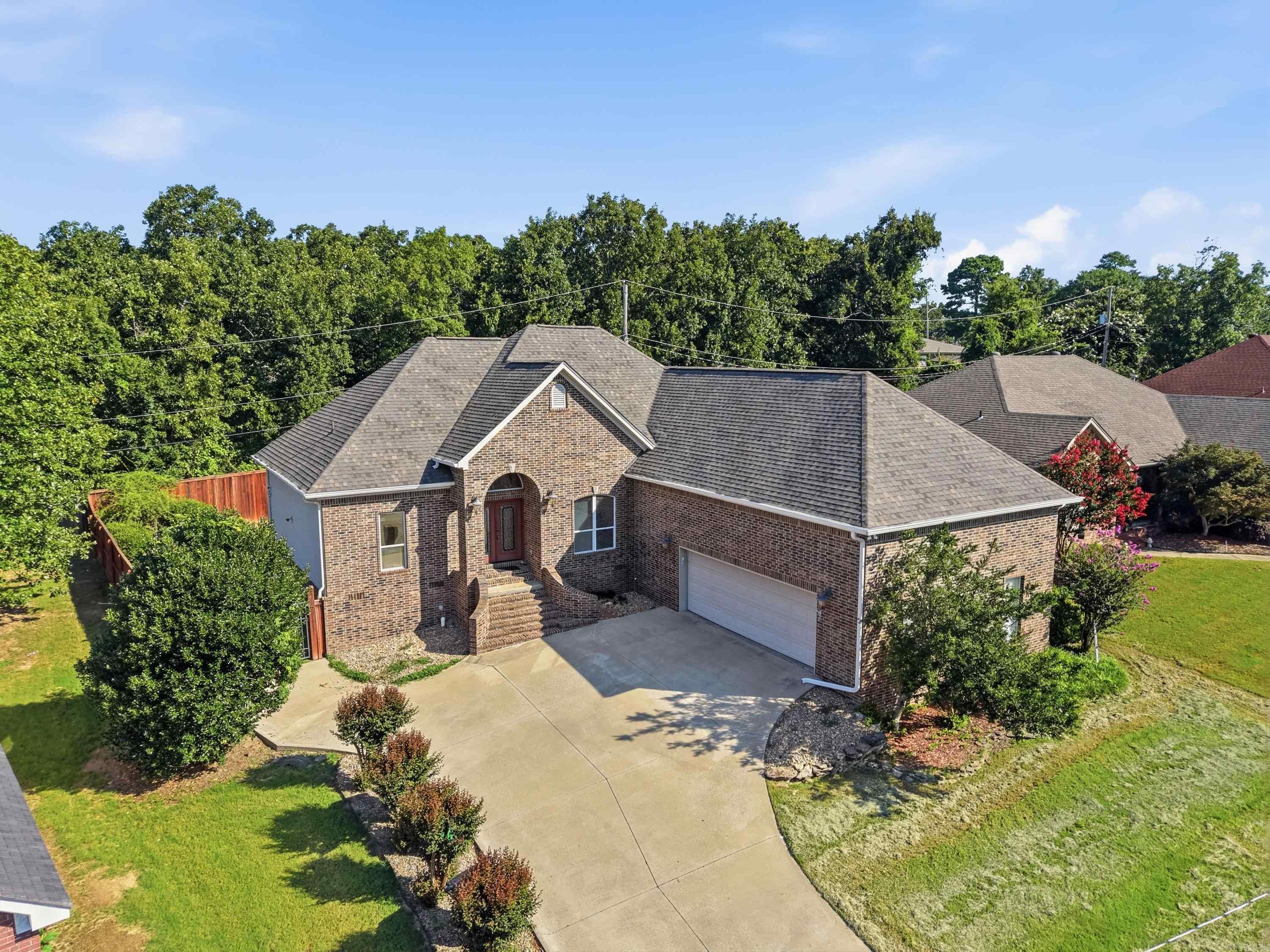 Welcome to 1521 Hidden Creek in the heart of Sherwood! This beautifully maintained 4-bedroom, 3.5-bath home offers the perfect combination of space, comfort, and peace of mind with an extensive list of recent updates already completed. Step inside to find fresh new carpet throughout, luxury vinyl plank flooring in the living room, and an updated downstairs living area designed for everyday living and entertaining. The spacious floor plan provides room for everyone, while the oversized garage offers ample space for vehicles, storage, or hobbies.  The kitchen is ready for its next owner with brand-new appliances installed in 2025, and the refrigerator conveys with the home. Major system updates include a new roof (2025), new upstairs HVAC system (2025), new insulation, and a new garage door opener system, giving buyers confidence in the home's long-term value. Additional features include a professionally encapsulated crawl space complete with a moisture barrier and dehumidifier, helping protect the home's foundation and improve energy efficiency.  Conveniently located near schools, shopping, dining, and everything Sherwood has to offer, Welcome HOME !!!