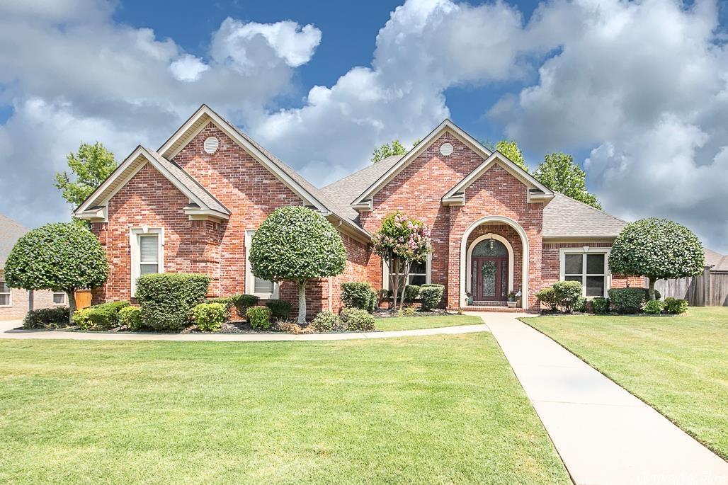 Beautiful home in sought after subdivision features 5 TRUE bedrooms.  Soaring ceilings, gorgeous molding & trim work, and hardwood floors are just a few stand out features.  Kitchen includes granite countertops, center island, under the counter lighting, double ovens, and a butlers pantry.  Oversized garage with storm shelter.  New roof 2022 & new gutters in August.  AC new 2017. This one will WOW you!! See agent remarks.