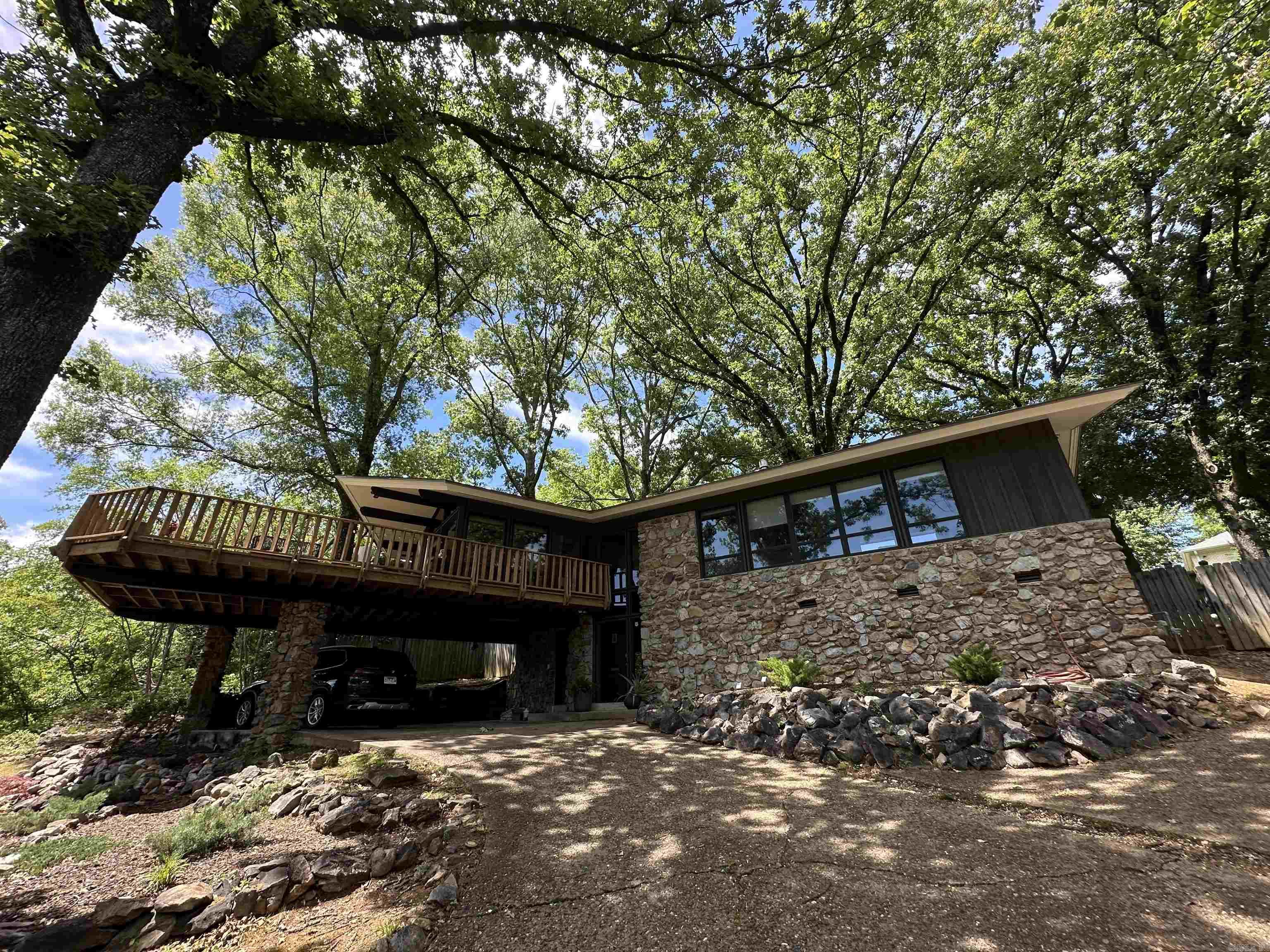 Sold before listed, extensively updated while maintaining original mid century modern charms. Architect built home with beautiful features throughout. Completely remodeled kitchen, primary suite including bathroom. New hardwood floors, tile, and fixtures throughout.