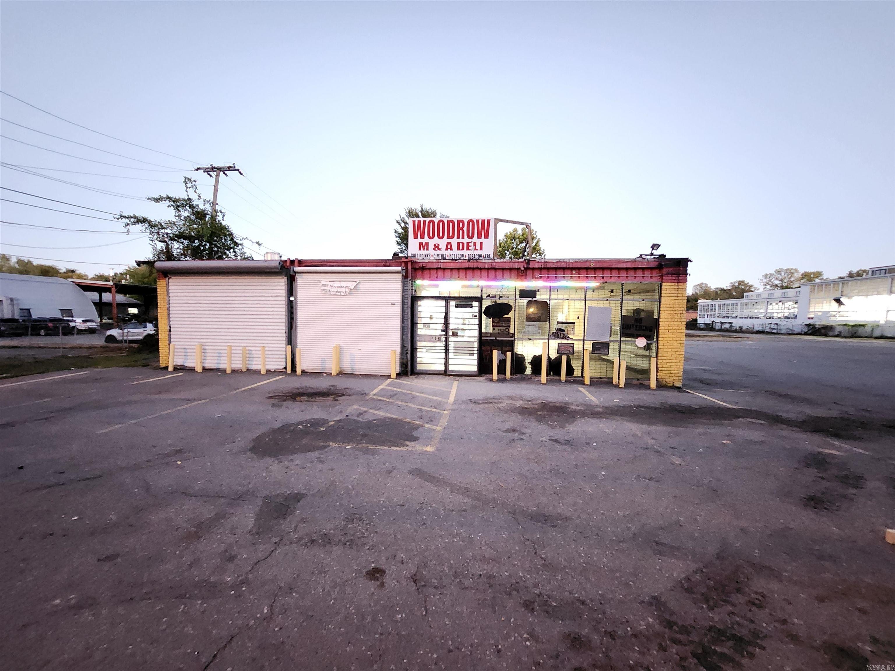 Investment Opportunity!!!  LOCATION..LOCATION..LOCATION.. Property previous use was C-Store Mart & Deli w/additional streams of income from food & apparel sales.. It's location in a HIGH TRAFFIC area, surrounded by Residential, other Commercial properties & Factories, kept the doors swinging, ESPECIALLY AT LUNCH TIME!! This OPPORTUNITY is TURN KEY READY!! (2) Walk-in Cooler w/ 17 Vertical Displays, (2) Commercial Refrigerators w/4 Vertical Display  , Commercial kitchen,  tons of shelving, Office, un-used space to expand within the walls... The POSSIBILITIES HERE ARE ENDLESS***i.e. Re-Open C-Store, Restaurant, Grocery Store w/deli, Office Space, Warehouse, etc....***AGENTS SEE REMARKS***