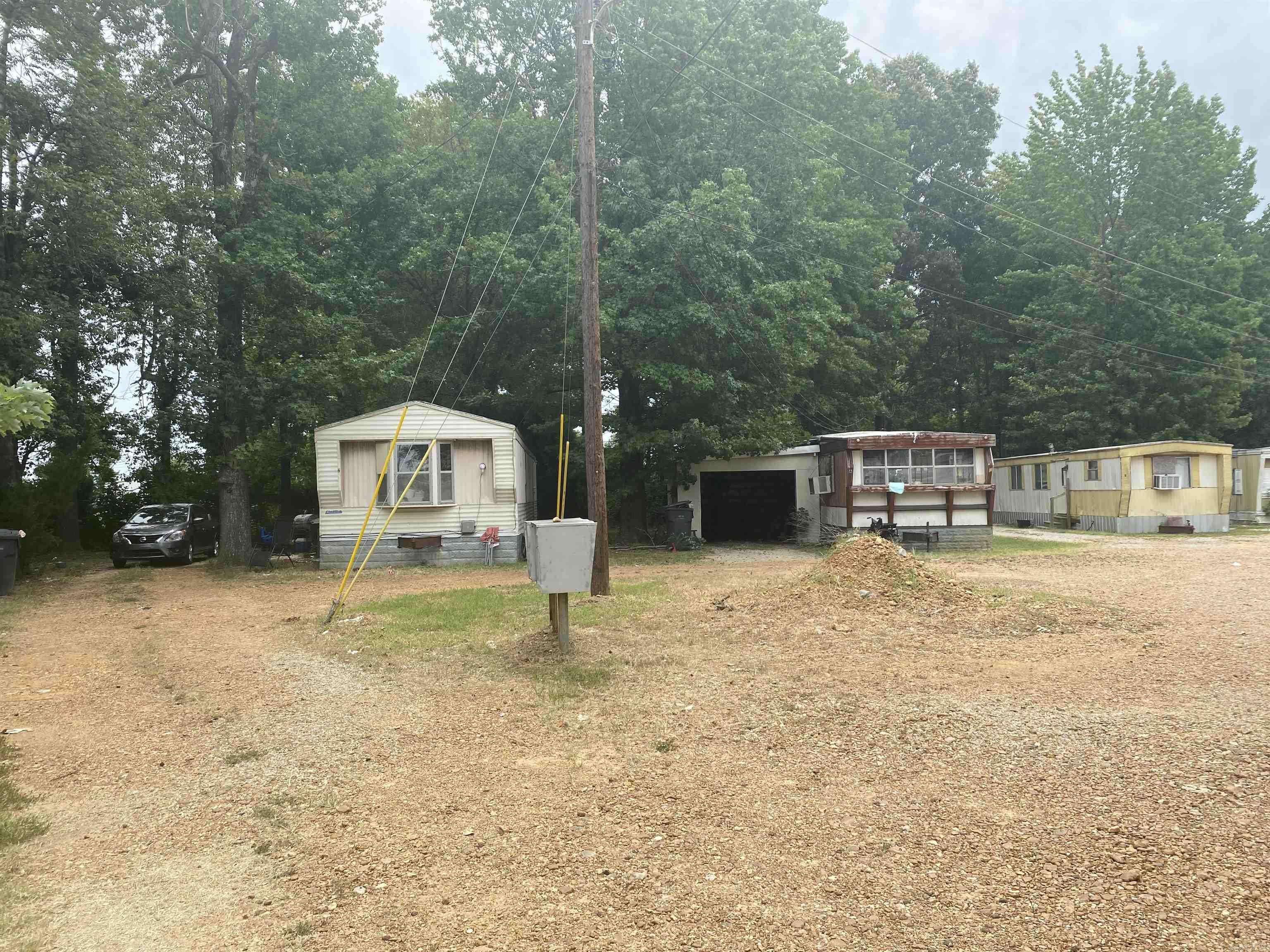 Portfolio of 4 Mobile home parks in Jonesboro AR consisting of 29 park owned homes, and 2 vacant pads. 3 of the 4 parks sit on R-3 high density multifamily lots and the 4th sits on a C-3 zoned lot that is grandfathered in for its existing use or would make a great place to build a self storage facility. Owner financing is available with a substantial down payment. Call for more information or to request financials.   Portfolio address: 212 Pecan, 215 Pecan, 405 N Rogers, 1414 Nelms, 1416 Nelms.