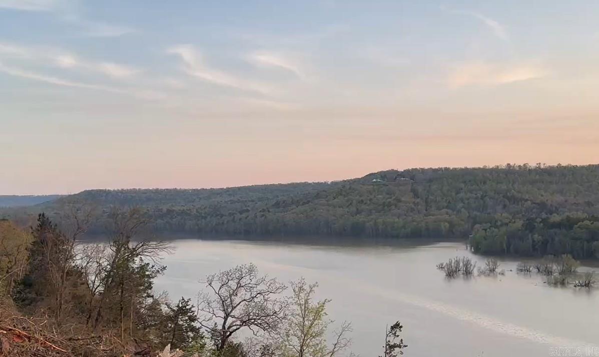 LAKEFRONT/LAKEVIEW LOTS ON GREERS FERRY LAKE Lot #7 Whispering Pines Subdivision The views have been cleared, and the lot is ready to build on. You won't find a better view at this price and there are 3 different boat launches nearby. Realtors, see attached Covenants and Plat. Ready for your lake home or Air BnB.