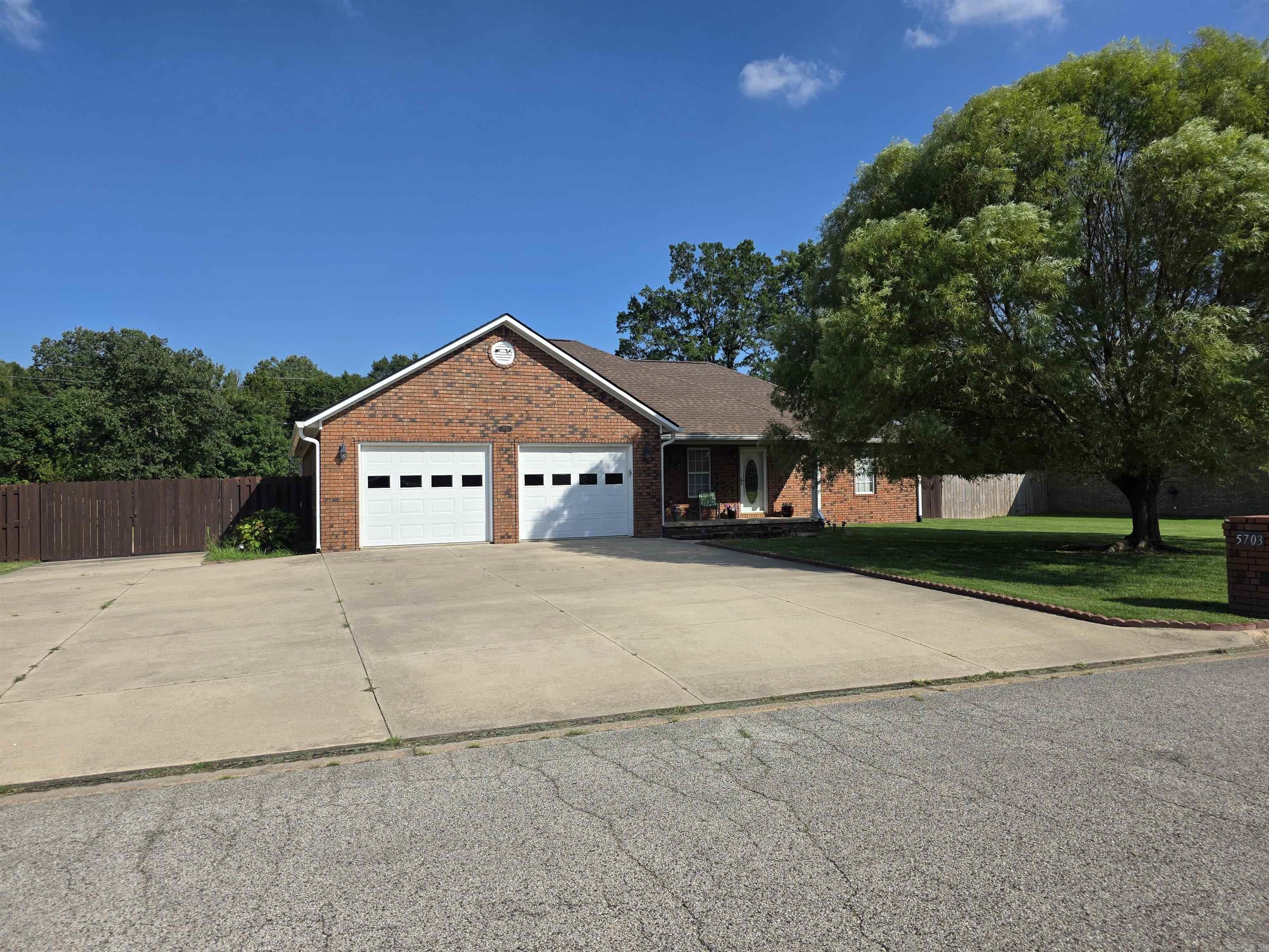 Three Bedroom, Two and 1/2 baths with a Sunroom and a huge backyard overall .55 of an acre  with a storage Building.  One Owner Home that has been very well taken care of.  New Roof was added in 2022, New fence added this year and a New HVAC was added this year. All Appliances stay including the Refrigerator. Also it has an RV Hookup with Sewer and 55 AMP. Laminate Floors and Tile Floors. Beautiful with Crown Molding throughout the house, Manificient large Refrigerator Freeze comination. Large Laundry room with a sink and half bath in it.  I almost forgot the yard has an irrigation system in place. One last thing the Master Closet also is a safe room or tornado shelter.