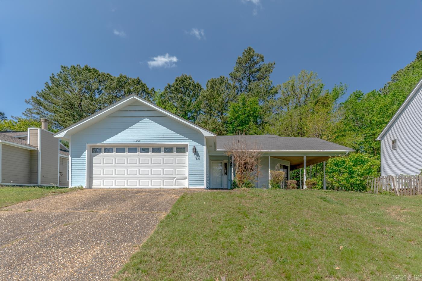 Welcome to Market 13900 Wimbledon Loop of the Otter Creek Community Subdivision in Little Rock, Arkansas. Situated on a .18 +/- acre fenced lot is a renovated traditional 1985 build, wrapped in wood, topped w/ 2026 architectural shingles, and accented by a covered porch, back deck, and 2 car garage. The interior features 1,390 sf with 3 bedrooms and 2 bathrooms. The primary suite includes a large walk-in closet and en-suite with dual vanity and shower/tub combo, while the guest bathroom offers a shower/tub combo. The living room holds a vaulted ceiling, cozy gas fireplace, and access to the backyard deck. The eat-in kitchen includes bar seating, electric stove, and stainless steel appliances. A large laundry room completes the layout. Seller improvements include fresh paint, flooring and fixtures throughout, updated bathroom cabinetry, and a refurbished deck. Area amenities include tennis courts, trails, clubhouse, pool, playground, and fitness center. Conveniently located near favorite local amenities with easy access to I-30. Call today to schedule your tour and make this house your home or next addition to your rental portfolio.
