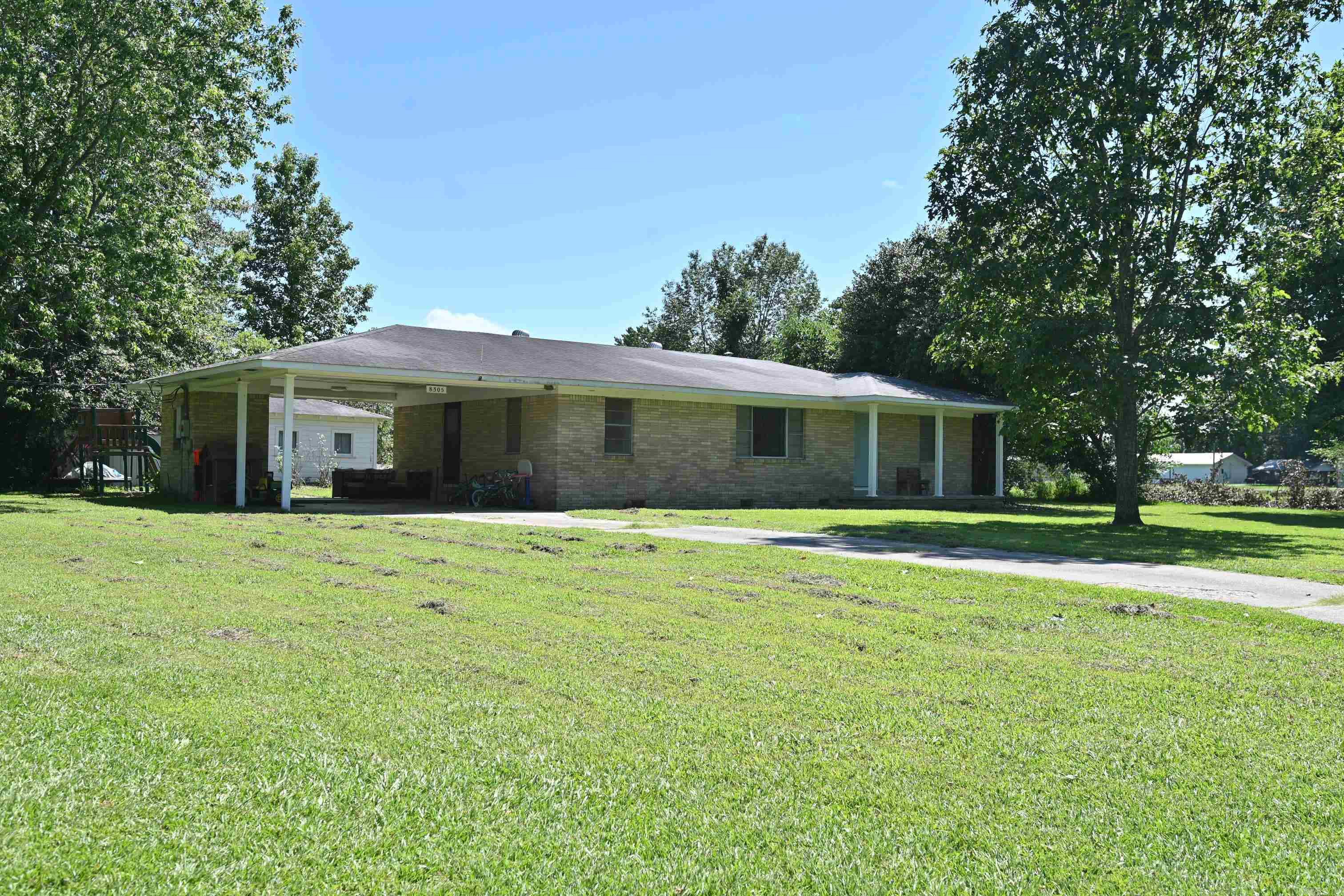 If you've been looking for a peaceful country setting, this charming 3-bedroom, 1-bath home in Tull deserves a look. Situated on just under an acre, the property offers open views, room to enjoy the outdoors, and a small outbuilding for extra storage. Inside, the original hardwood floors have been exposed, bringing back the character and charm of this classic ranch-style home. Well cared for over the years, this property is ready for its next chapter and offers plenty of potential for a variety of buyers.