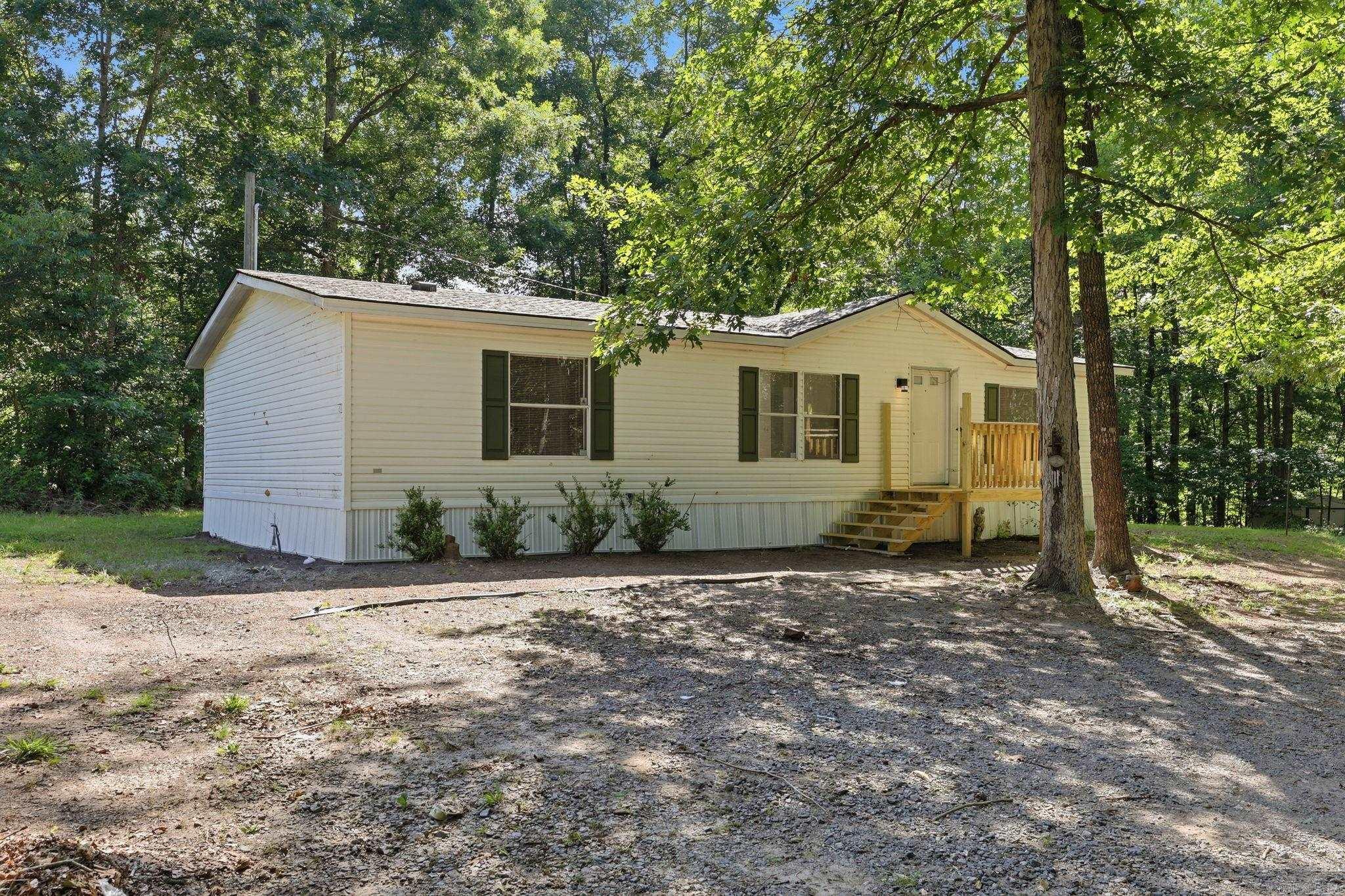 This move-in ready wonderfully updated home on 1.37 acres in Saline County is a hidden gem! Experience the tranquility of country living just outside the city limits. The newly renovated living, dining, and kitchen areas are filled with natural light and the bright, open floor plan provides a perfect flow for everyday living. Three spacious bedrooms offer generous closet space, while the primary bath includes a separate shower and tub with built-in storage for added functionality. This home features modern updates throughout such as updated flooring, fresh interior paint, new kitchen appliances, and a dedicated storm shelter for added peace of mind.   Schedule your private showing today and experience all this hidden gem has to offer!