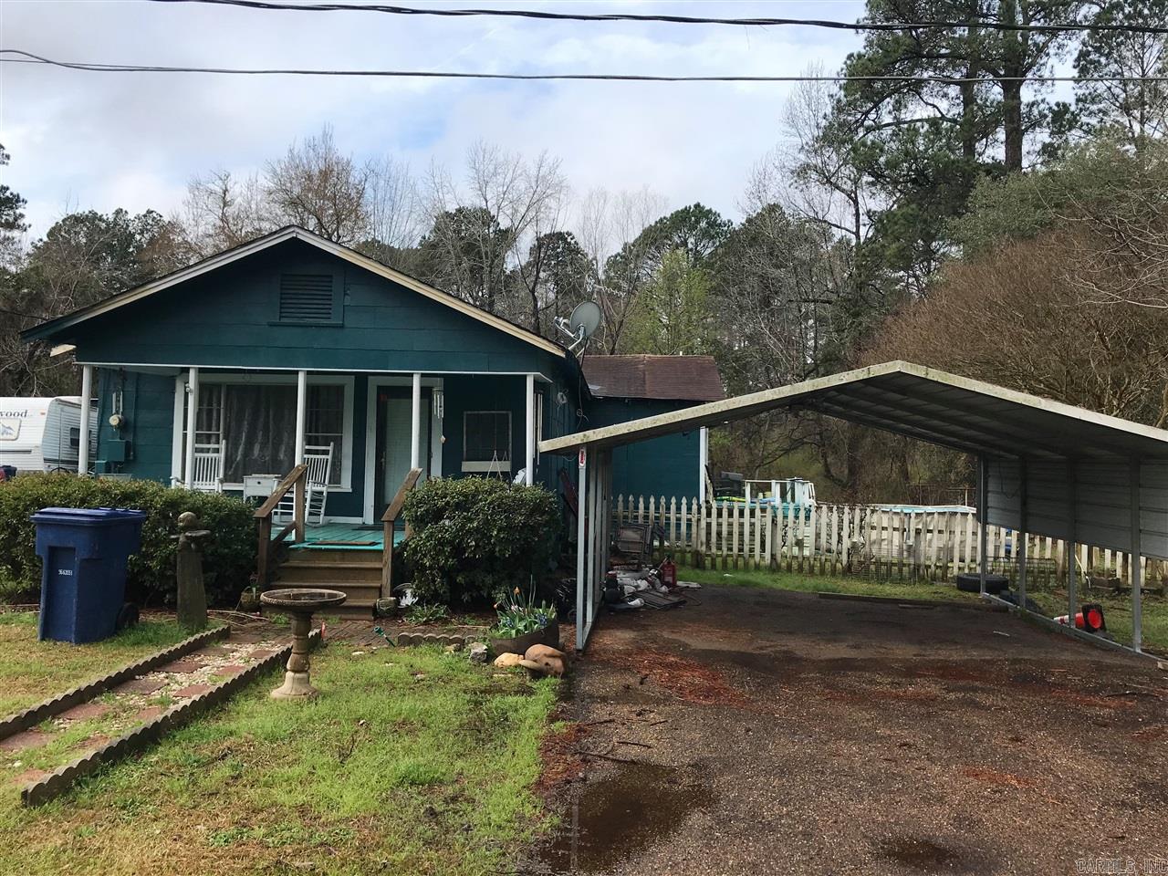 REDUCED!! This is a 4 bedroom home. In 2018 a new central heat and air was installed. This property has a nice front porch, side porch, storage shed, inside is very spacious with a large eat in kitchen, new cabinets, lots of storage. The extra bath has not been plumbed but is there (could be 2 bath). This is a great location to live or have a rental. Call Teresia Thompson at 870-818-6083 or 870-837-1400.