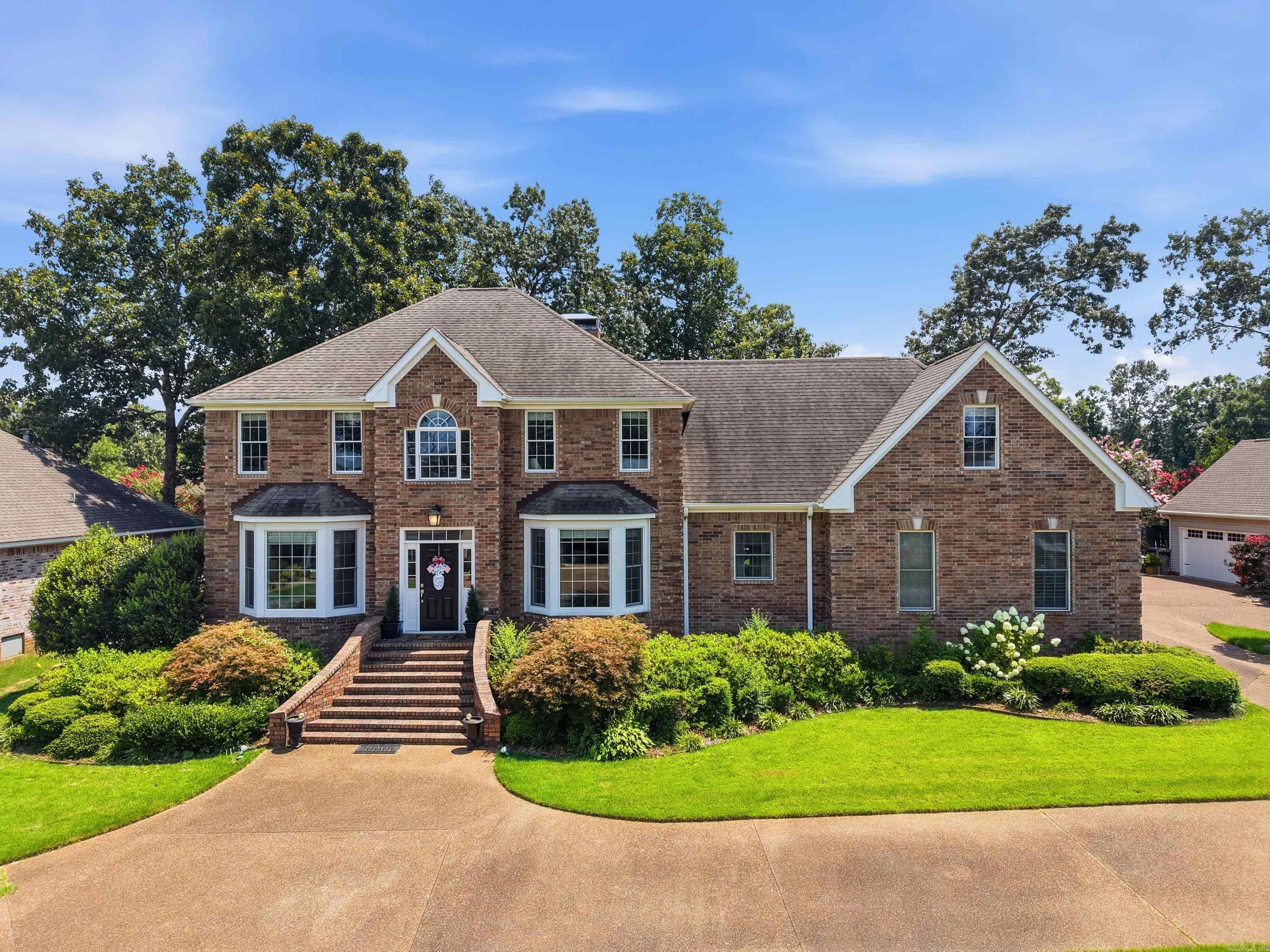 Welcome to this stately, impressive two-story home in one of Heber Springs most prestigious neighborhoods, just minutes from the lake. This 5 bedroom 3 1/2 bath home is the perfect layout with multiple living spaces that provide flexibility for everyone in the family. The main level is made for entertaining with soaring vaulted ceilings, an updated stone fireplace in the living room that opens up to a large covered deck. The kitchen has been upgraded with white painted cabinets, beautiful granite, and a stylish backsplash. Upstairs offers a separate living area plus a bonus room with a kitchenette and its own bathroom that could easily serve as an office, apartment or an amazing teen bedroom!  A new fully fenced backyard, sprinkler system and beautifully maintained landscaping creates the perfect outdoor oasis to enjoy nights by a fire. Don’t miss the opportunity to own this luxurious home in the sought-after Copperfield Subdivision.