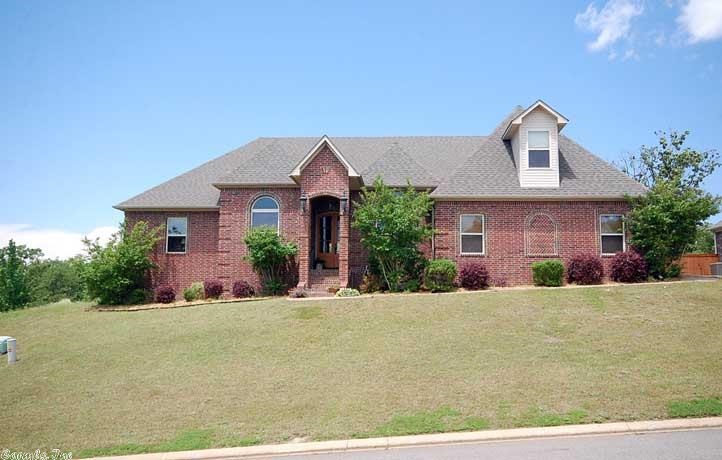 Stunning home,w/lake view from front yard,4bedroom, 3bath home,w/massive master suite,master offers plenty of space & romantic fireplace w/onsuite, double sink vanity w/large closet,sep tiled shower & jetted tub,massive master closet too!Gourmet kitchen,large breakfast bar,granite,tile backsplash,double oven,stainless appliances,open to LR & offers a great backyard view, living room offers fp, view &walk out onto covered porch w/built in grill, formal dinning room & Bonus area, plus executive office!