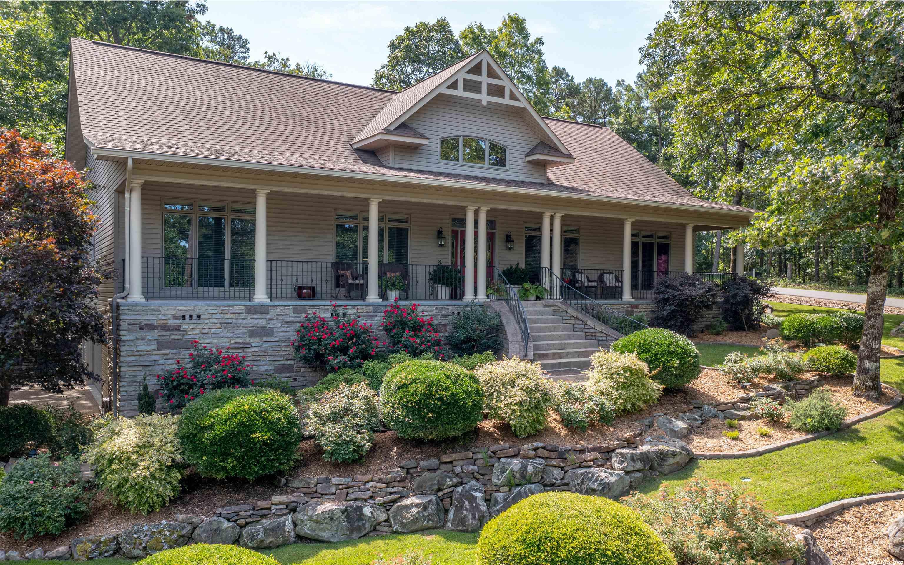 Relax & enjoy the view of the 17th green & fairway of Ponce de Leon golf course. This custom home offers the best of both worlds privacy & access to the course. An adjacent lot conveys w/ the home & even has a fenced area for your pets. Located close to amenities including restaurants, trails, & lakes. Featuring gas log fireplace, 500 gallon buried propane tank, stonework landscaping, upgraded appliances, oversized garage, outdoor living in both the front & back. Your own private resort. Agents see remarks.