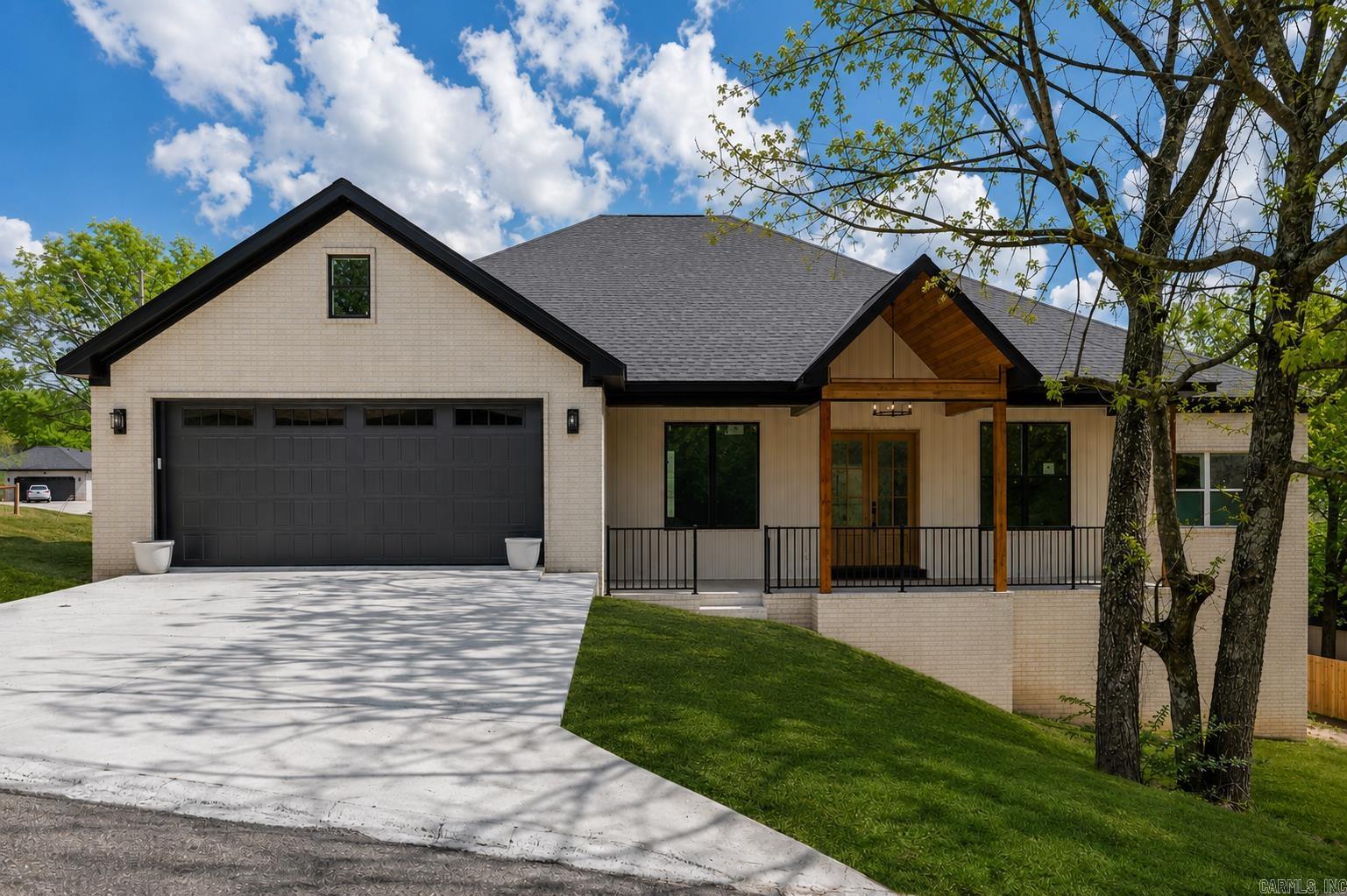 Look no further, you've found The One. This home was designed with a neutral upscale look. This beautiful home features 3 bedrooms and 2 1/2 bathrooms. It also has a beautiful office with a closet that could be a 4th bedroom. This home offers comfort and functionality. The open floor plan and light neutral colors are inviting. Enjoy the welcoming front porch or the spacious back deck. It has a separate dining room, eat in kitchen, island in the kitchen, walk-in pantry, large laundry room and large master closet. Access to the beautiful back deck from the master bedroom and living room. Beautiful appliances. Lovely gold hardware throughout. Beautiful, stained gable on the front porch along with black railing. Come see for yourself. Welcome Home! (First photo is AI generated) Items to be completed before closing. Insulation in attic, quarter round, sod, some landscaping, mirrors, glass shower door & closet rods.