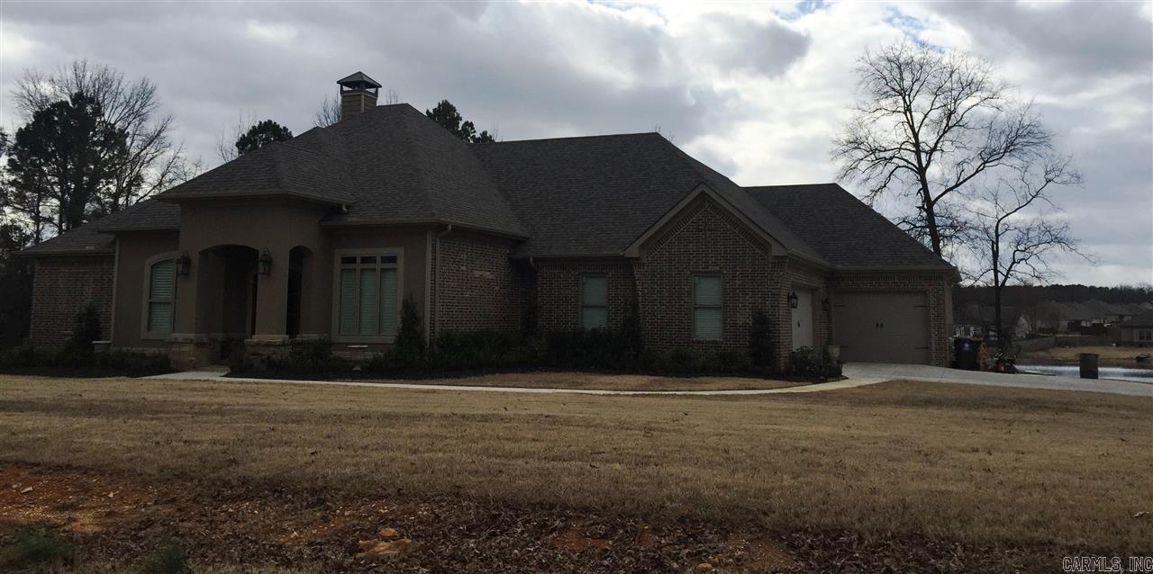 extra landscaping, side load three car garage. Formal dining, office, kitchen opens ro great room.  Kitchen has stainless steel appliances, granite in all wet areas. Hardwood inb main living areas. Carpert in bedrooms.