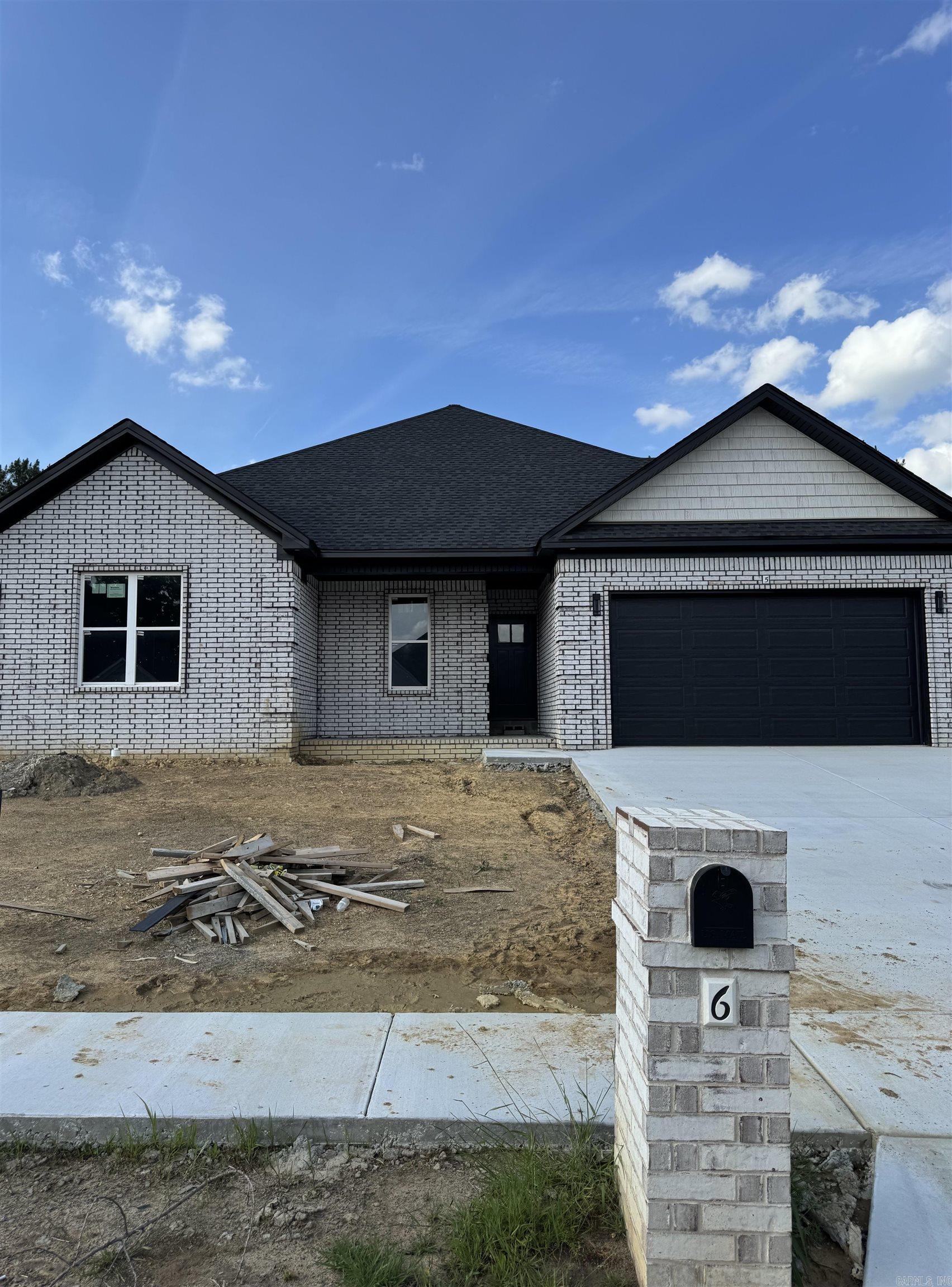 Welcome to this stunning new construction all-brick home, perfectly blending modern elegance with comfort. This 4-bedroom, 2-bathroom beauty features spacious rooms and an open floor plan that’s perfect for both everyday living and entertaining. Each of the generously sized bedrooms boasts large closets, providing ample storage for all your needs. The luxury primary suite is a true retreat, offering a spa-like atmosphere with a large soaking tub and a custom-tiled walk-in shower—perfect for unwinding after a long day. The home is bathed in tons of natural light, highlighting the modern colors and high-end finishes throughout, from the standout accent walls to the spacious quartz-topped kitchen island that is sure to be the heart of the home. Seller offering $8,000 in buyer concessions!! Schedule your tour today!