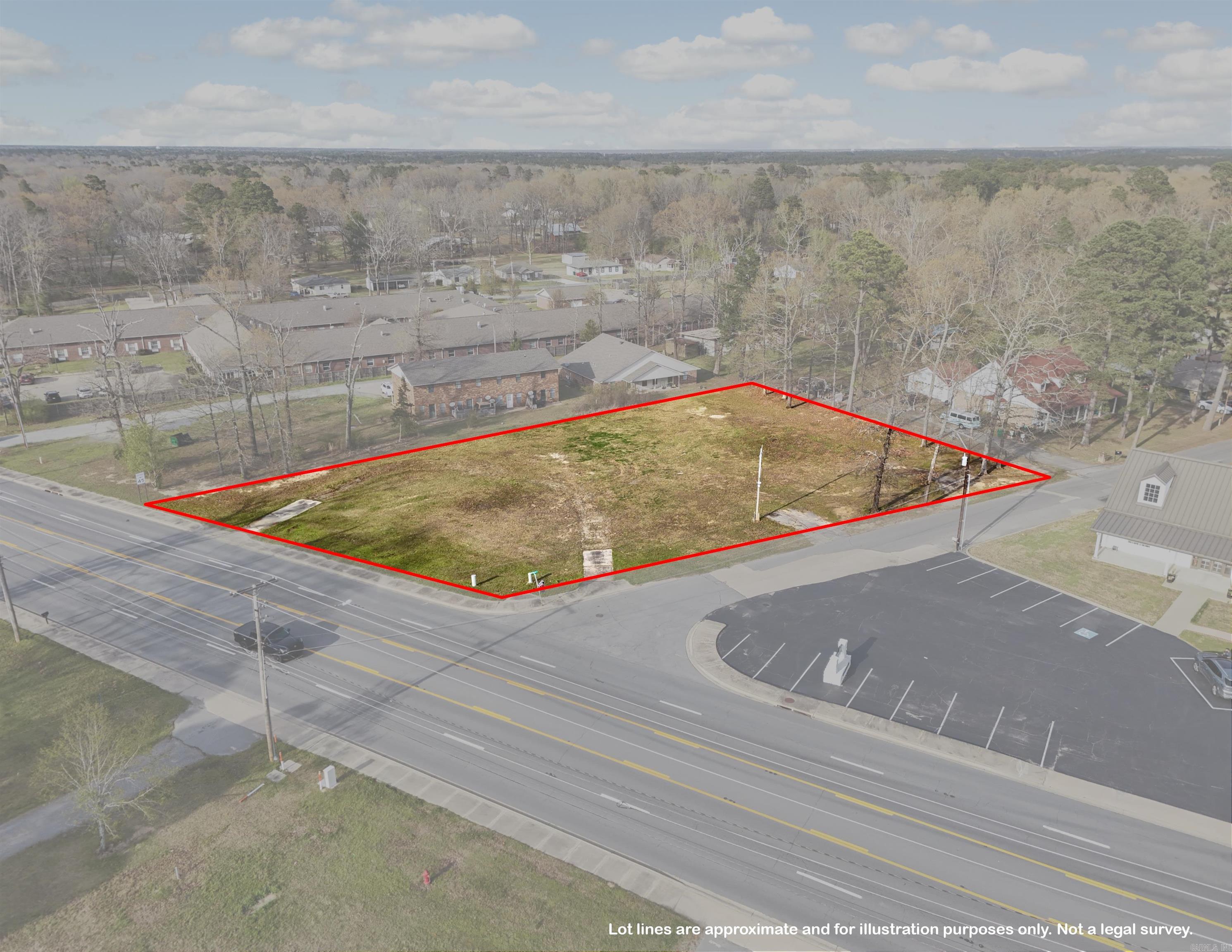 Looking to build your next business or office space? Check out this commercial lot- in the center of White Hall! Extremely high visibility and daily traffic count, the possibilities are endless. Located right on the corner of Dollarway road and Reynolds road- for easy access. Over an acre of ground ready for you!