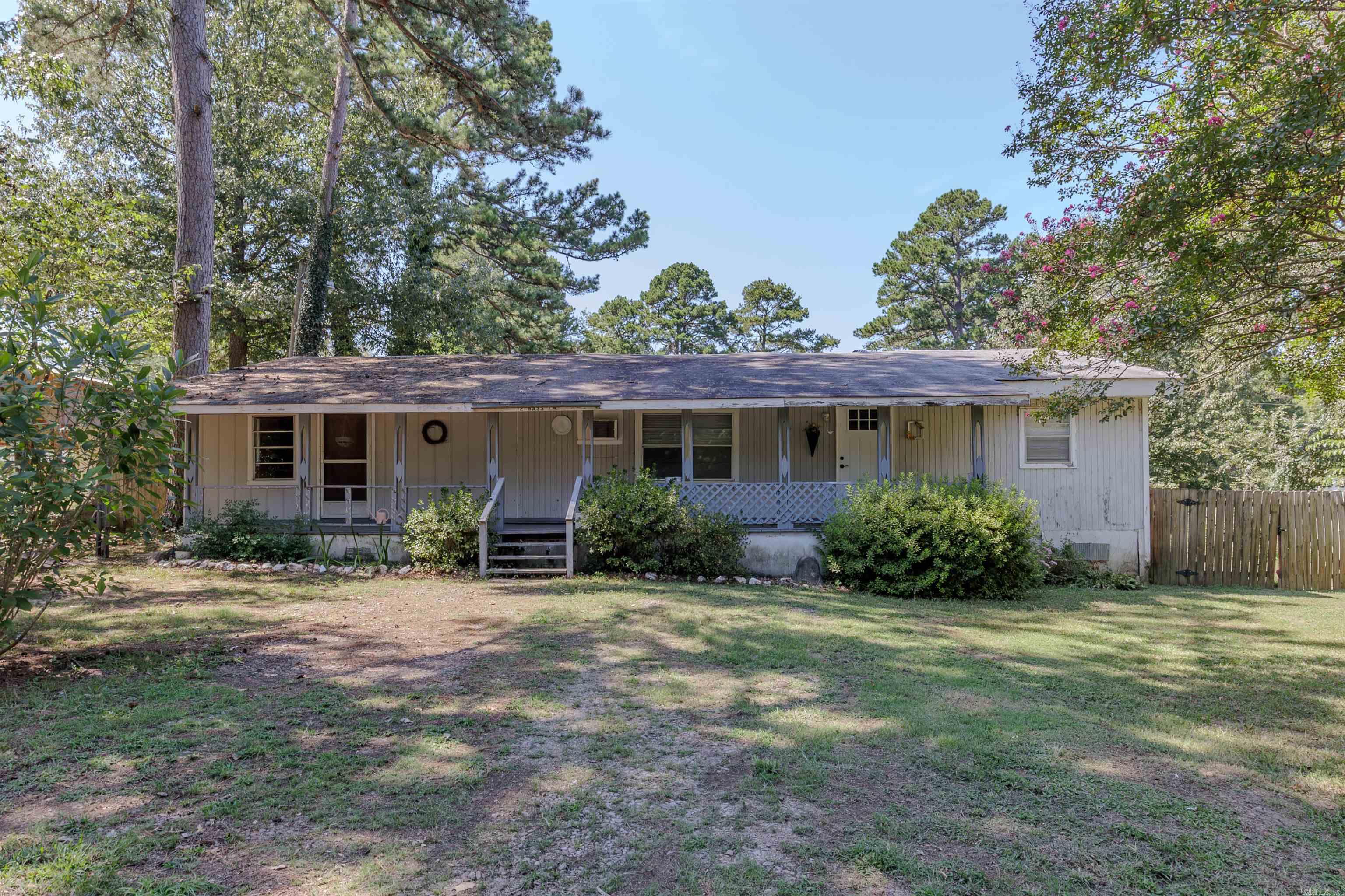 Close proximity to Harris Brake Lake! Great property to have huge equity in by finishing it out yourself! Currently being lived in and just needs final touches. The back portion of this home was a manufactured home that has been completely gutted and all manufactured home parts removed to be built on permanent foundation. There was an add-on to the front doubling the square footage for a total living square footage of approx 1,344 sq/ft. This property is heated with propane wall heater. 2 window units cool the home. There is a massive kitchen with tons of cabinets!!! This property just needs someone to come finish it to their liking! Property is being sold AS-IS, WHERE-IS. Buyer is encouraged to do an inspection for informational purposes only!  NOTE: Properties will not qualify for conventional 30 year financing (ie FHA, VA, Conventional or USDA RD).