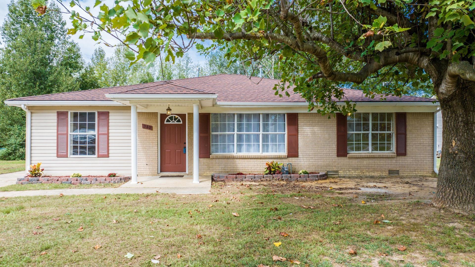Adorable 4 bedroom 2 bath home perfect for a first time home buyer! This house has been completely remodeled from top to bottom. Large kitchen with new dishwasher, custom tile backsplash, plenty of counter space, cabinets and a pantry for storage. Spacious master bedroom and bathroom. Master bathroom includes his and her closets whirlpool tub and separate walk in shower.  New carpet in bedrooms, new laminate floors throughout home and tile in laundry room and bathrooms. Home has new light fixtures/ceiling fans and new paint throughout. Home also has new HVAC and the roof is only 2 years old. You will enjoy the large fully fenced backyard with shop. The 24x32 shop includes electricity.  You don't want to miss this one!