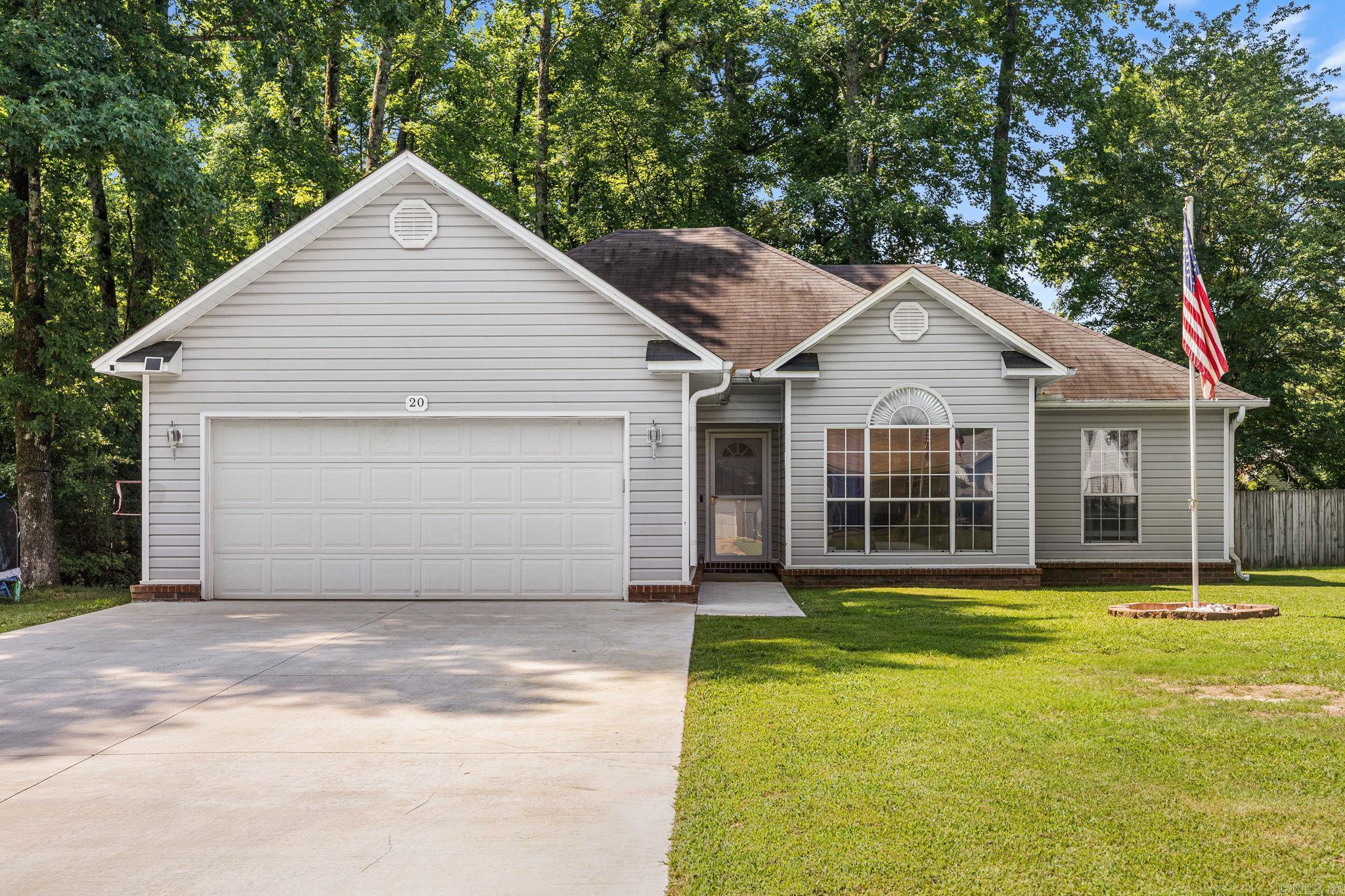 Welcome to 20 Hunters Cove! Tucked away on a quiet cul-de-sac in Cabot, this 3 bed/2 bath move-in-ready home has been thoughtfully updated with some of the big-ticket improvements already completed. The beautifully remodeled kitchen is the heart of the home, featuring quartz countertops, stainless steel appliances, and a refrigerator that's just 2 years old. The open, inviting living spaces offer the perfect setting for everyday living and entertaining alike. Step outside to enjoy the large new composite deck, installed within the last year, overlooking the fenced backyard—an ideal spot for morning coffee, grilling, or relaxing with family and friends. Additional updates provide added peace of mind, including a new concrete driveway poured within the last year, laminate flooring in the main living area, an HVAC system approximately 8 years old, and a roof that's 10 years old.  Located just minutes from the park (accessed by a private trail), Cabot schools, shopping, dining, and everyday conveniences, this home combines modern updates, lasting value, and a desirable location. Don't miss your opportunity to make 20 Hunters Cove your next home—schedule your private showing today!