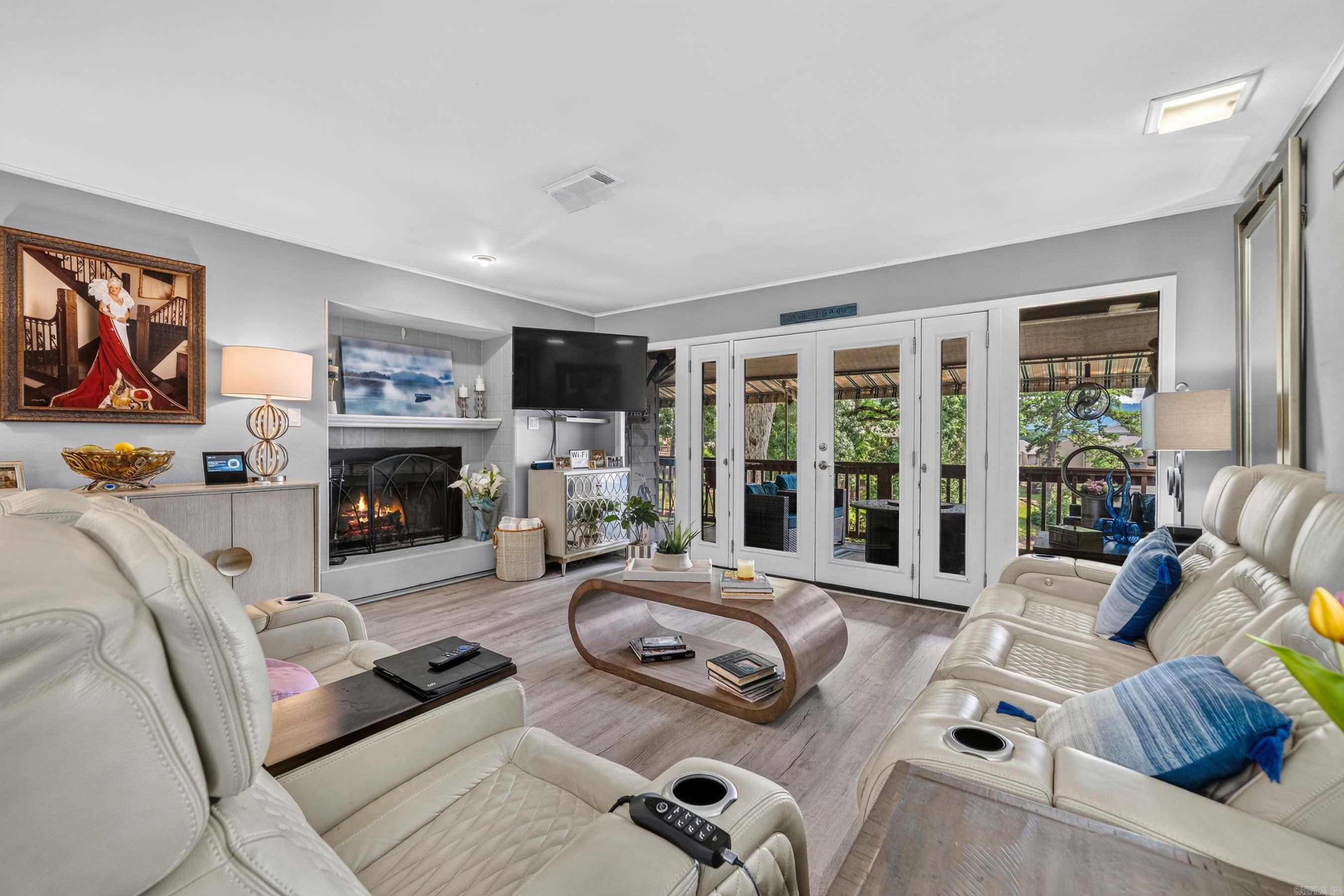 This upper level unit at Northshore Condos is a absolute MUST SEE !!! Too many updates to list but safe to say it is better than when it was new! This unit is nestled in the trees overlooking a quiet cove with the main channel in the background. COVERED BOAT SLIP !  This is an ideal weekend getaway or short-term rental investment!