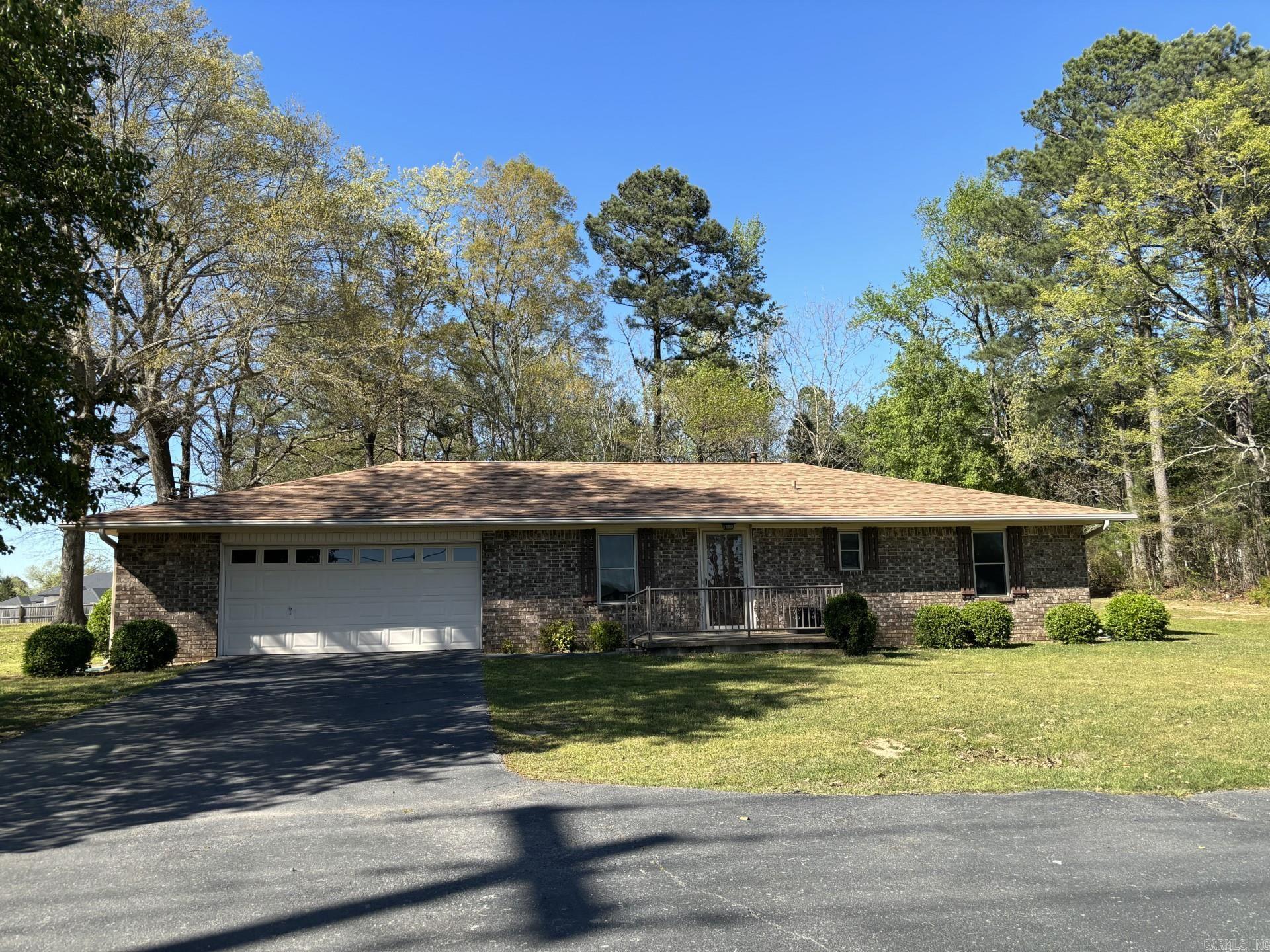 This home makes you feel kike you are in the country but close to schools, shopping and more  sits on .63 acres, has large hardwood trees. This home has been totally updated!! New counter tops, appliances, LVP flooring in main living areas, carpet in bedrooms. Bathrooms have new cabinets, New  tub/shower.