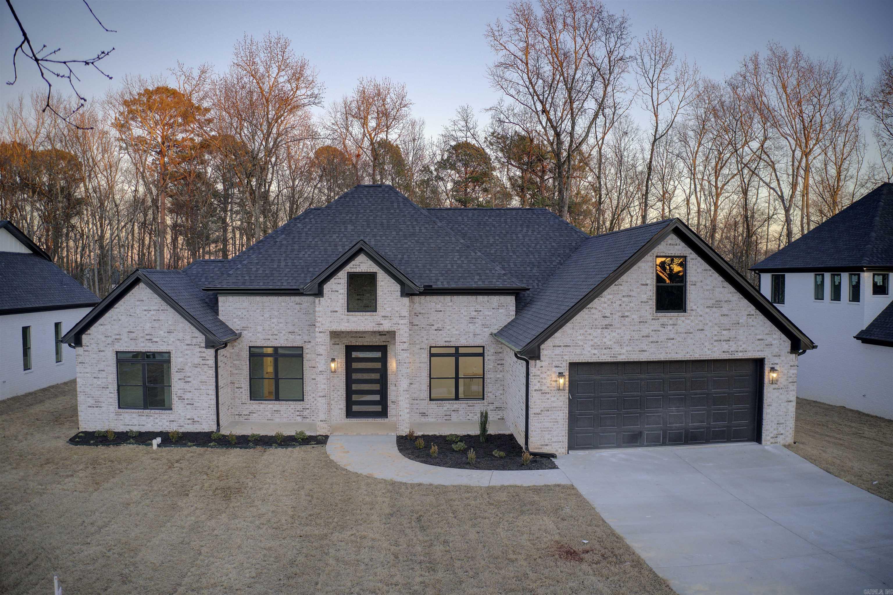 Welcome to 7220 Severn Landing. You will enter this beautiful new construction home by opening the luxury pivot iron front door. As you enter the foyer you will find a home office to your right. You will then enter in the kitchen and find a lot of cabinets for storage as well as a 10-foot kitchen island. This home also has a large butler pantry in addition to a walk-in pantry. You will find the primary bedroom downstairs, 3 other bedrooms downstairs, as well as an office. Upstairs you will find a bonus room with a walk-in closet.