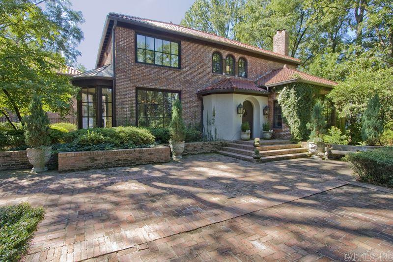 Stunning Edgehill home with exceptional living spaces.  Numerous renovations and the ultimate in quality craftsmanship.  Unparalleled design and construction combine with old world charm to create spectacular setting for family living and dining.  Vaulted brick ceilings and floor to ceiling arched windows overlooking fabulous pool and grounds.  Full Guest home with approx. 530 sf not included.