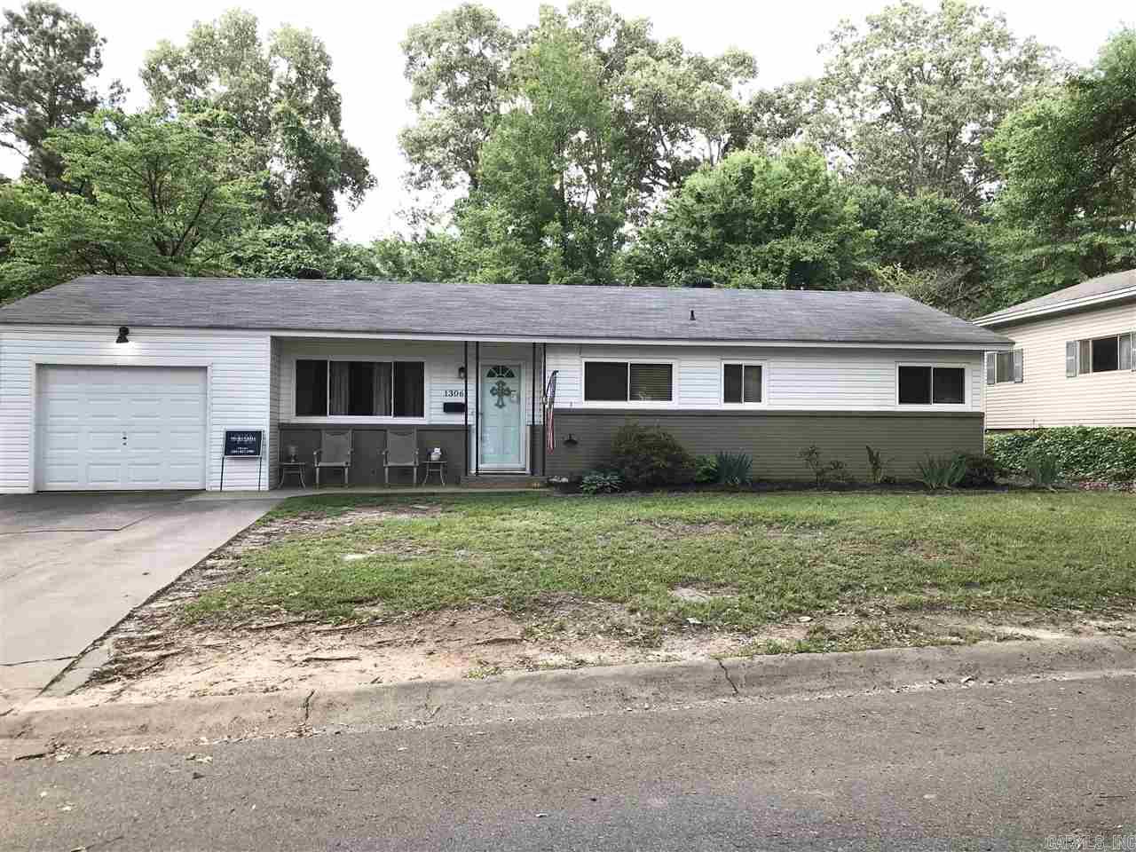 This Charming 4 bedroom 1 & half bath has beautiful original hardwood flooring & is a MUST SEE!! The 4th bedroom is separate from the rest & is large enough to be used as an Office, Den or Game Room! Fresh paint & new Roof in 2017!