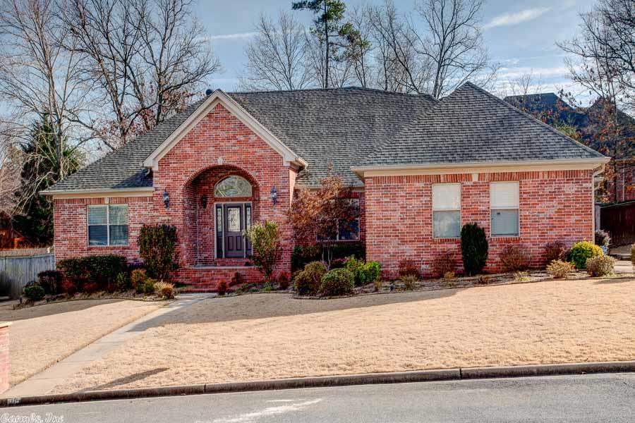 Wonderful Chenal home lives as a 1 level with all bedrooms down & the Master suite apart. Bonus room and 1/2 bath up. Immaculate hardwoods in foyer, dining rm, master bdr & kitchen. Brand NEW carpet in bdrms and bonus room. Kitchen complete with granite counter tops, sit down bar & brkfast area open to a large great room with travertine floors. Lrg level lot with a stunning waterfall feature in the back. New tankless hot water heater, sec sys, sprinker sys & beautiful landscape lighting. Agents see Remarks.