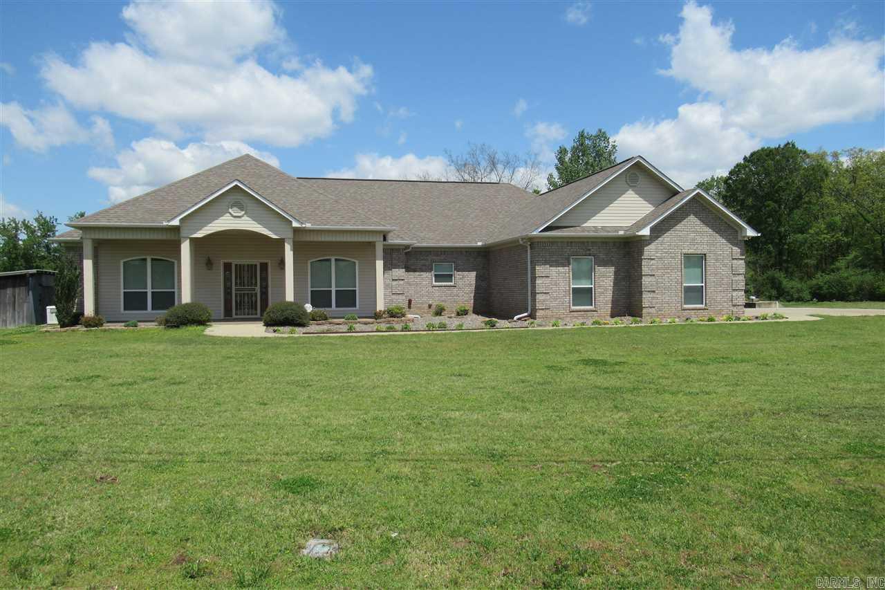 Beautiful 3 bedroom 2 bath custom built home with huge bedrooms and closets, 4th bedroom or office, nice kitchen with stainless steel appliances, laundry room with sink, whole house generator, over sized side loading garage, storm shelter, all this sitting on 1 acre. See agent remarks!