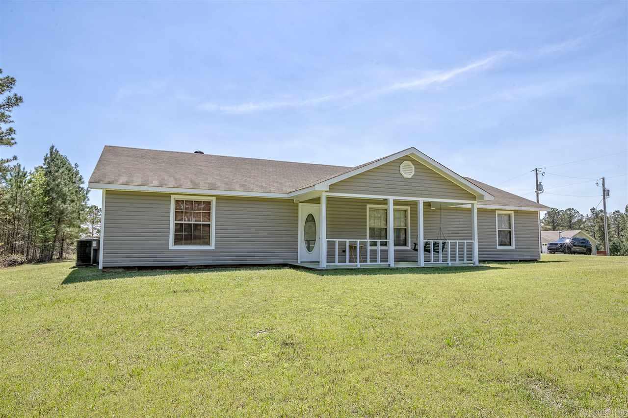 This 3 bedroom 2 bath split house with gorgeous log siding is one that your family will love! The large open living/kitchen/dining area is perfect for entertaining. Oversized master suite with 2 closets, separate tub and shower. On the other side, 2 comfortable bedrooms with connecting bath. 2 car detached garage with breezeway. Nice yard for the kids to play. School bus comes right to your door!