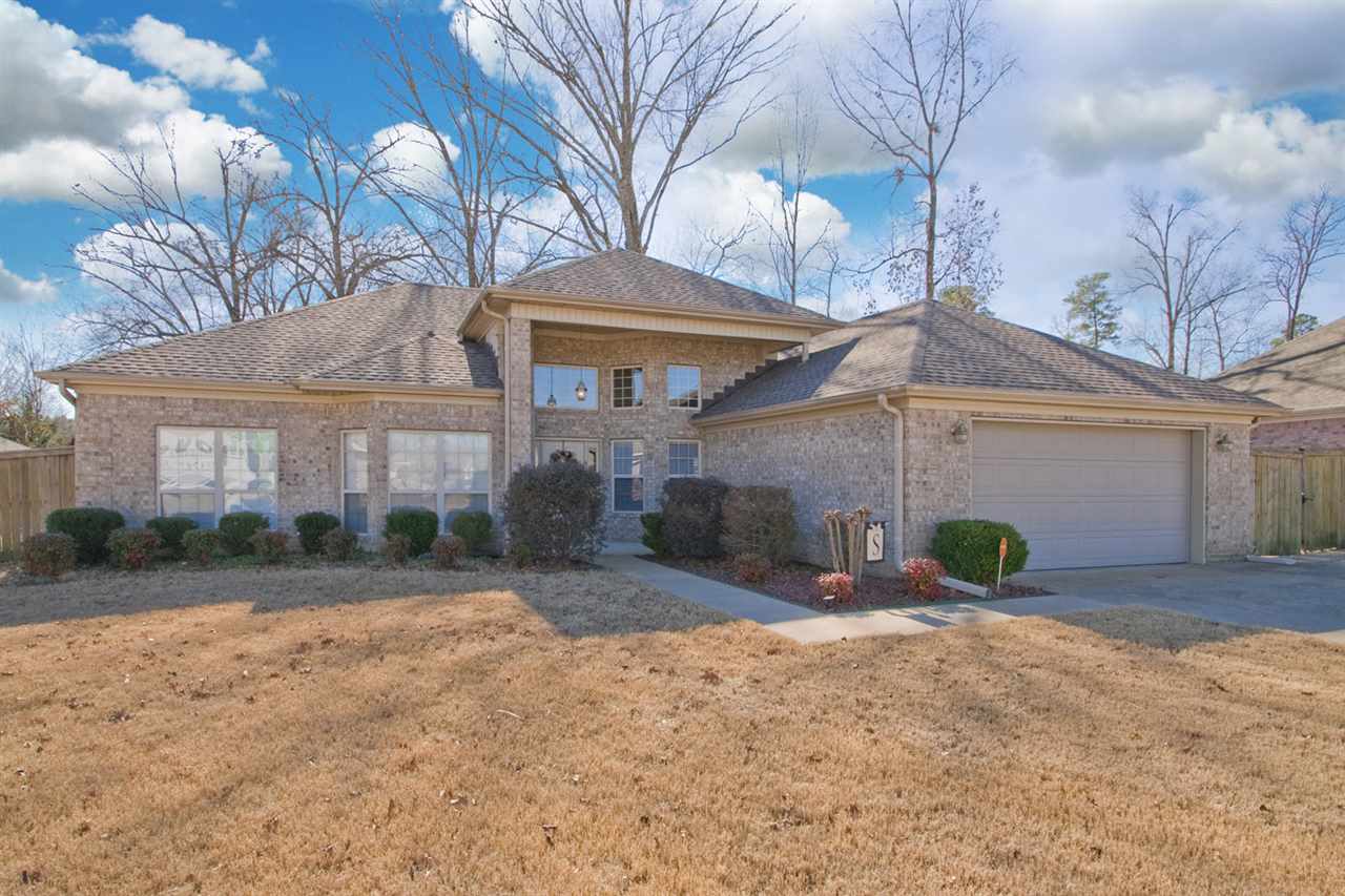 This move in ready house has it all! The 14 foot ceilings give such an open feel throughout the kitchen,dining, and great room. Lots of updates including granite countertops in the kitchen, new roof, and carpet( all in 2015). The lot is level and backs to private property. Extra bonus in the backyard- 16X20 building with a garage door and wired for electricity. This home is immaculate with 3 bedrooms 2 baths and an office.  Come see today!