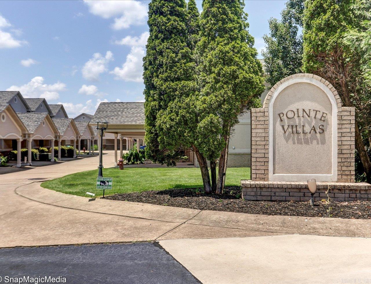 Enjoy fun in the sun and Endless Vacation! This fantastic location just off Central Avenue and near 1st Bridge offers a private retreat behind a secure gated entrance. Villa Pointe Townhouse features a covered carport entry. As you step into the open foyer, you'll find a beautifully designed open kitchen to your right, with the staircase to the upper level on your left, leading to a dining area and spacious living room. French doors open onto a covered deck with stunning views of Lake Hamilton.   The upper level boasts two bedrooms, each with its own en-suite bathroom. The primary bedroom includes a private upper deck showcasing breathtaking lake views.   This townhouse is conveniently located near all the amenities that Lake Hamilton and Hot Springs have to offer! Come make this your dream home! ?