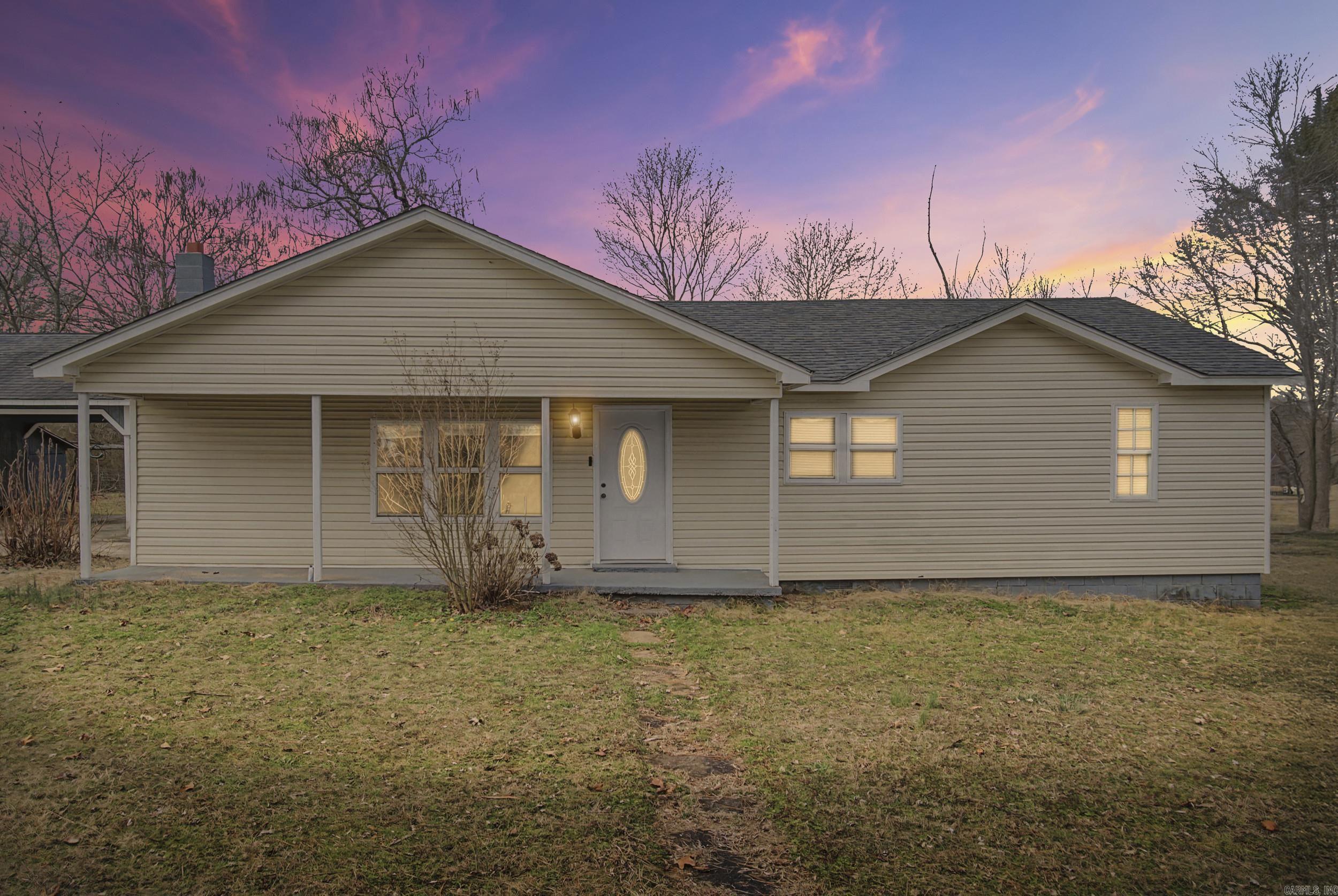 **SELLER TO GIVE CONCESSION FOR FLOORING** with a reasonable offer.  Welcome to 437 Dripping Springs, a delightful rural retreat offering comfort, space, and the peaceful charm of country living. This inviting 3-bedroom, 2-bath home features 1,376 square feet of well-designed living space, perfectly situated on a generous 0.88-acre lot. Step inside to a cozy and functional layout that feels like home from the moment you arrive. Outside, enjoy room to roam, garden, or simply relax and take in the serene surroundings that make rural living so appealing .A standout feature of this property is the attached 2-car carport along with an additional storage shed, providing plenty of space for tools, equipment, and seasonal items. Say goodbye to clutter and enjoy the convenience of dedicated storage that keeps everything organized and easily accessible.Whether you’re seeking quiet country living, space to spread out, or a home with practical extras, 437 Dripping Springs offers the perfect blend of comfort, functionality, and outdoor freedom.