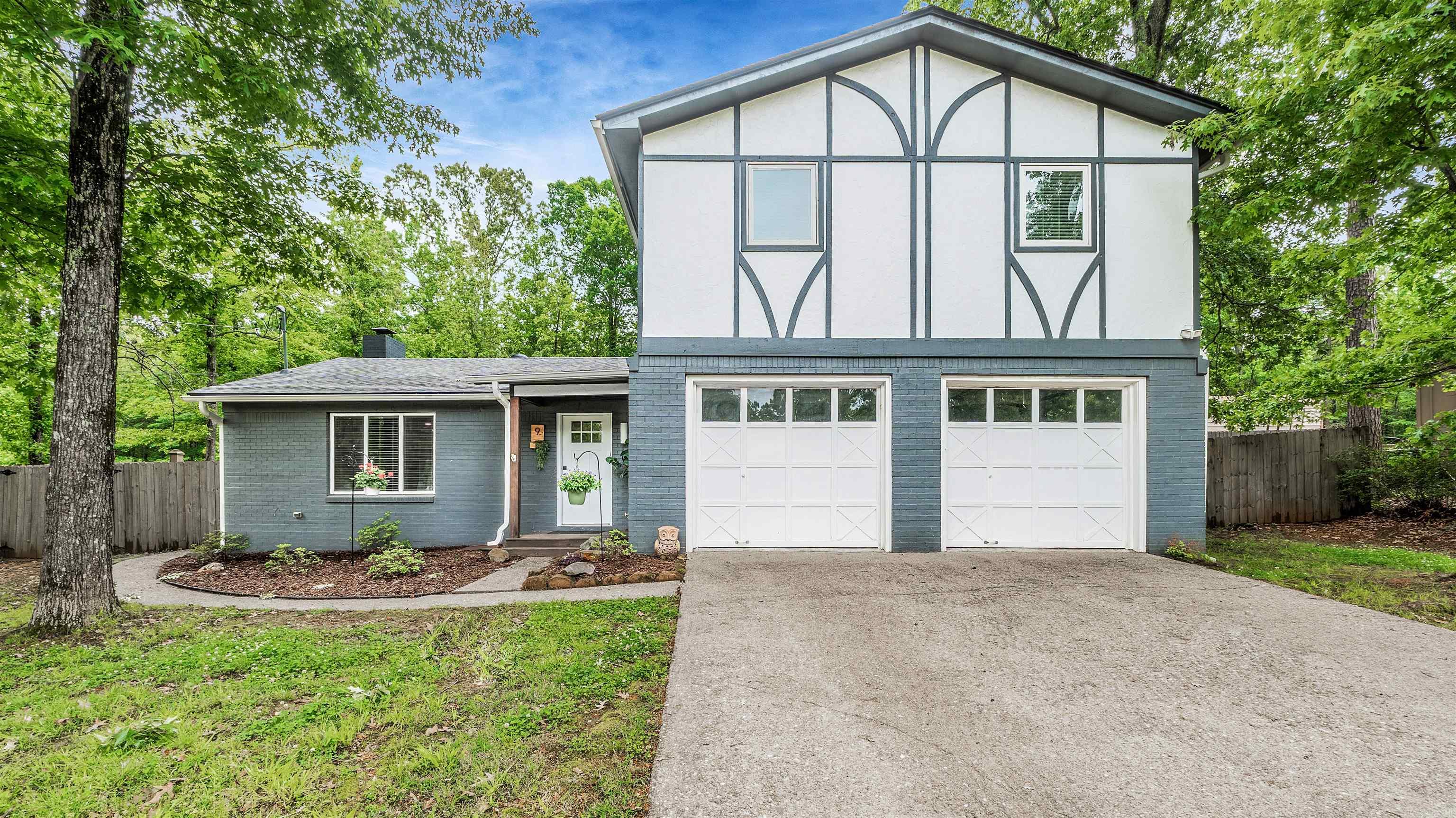 Looking for a home on a larger lot but still closer to town?  Come check out 9 Whispering Drive!  Conveniently located in Alexander, enjoy close proximity to both Little Rock and Saline county.  So much to fall in love with here!  For starters, check out the new roof and new flooring downstairs.  The open kitchen/living concept is sure to be a favorite as well.  Thoughtfully updated, the kitchen has a breakfast bar and a nearby utility room with a half bath.  Exiting to the backyard, there is plenty of room to roam!  Enjoy this .46 acre, fully fenced backyard.  Perfect for play equipment, a garden or whatever else you need.  Upstairs are the spacious primary bedroom with ensuite bath, two guest rooms and a full hall bath.  Plenty of closet storage here as well.  Bonus - this home is on a cul-de-sac lot so zero cut through traffic.  Welcome home!