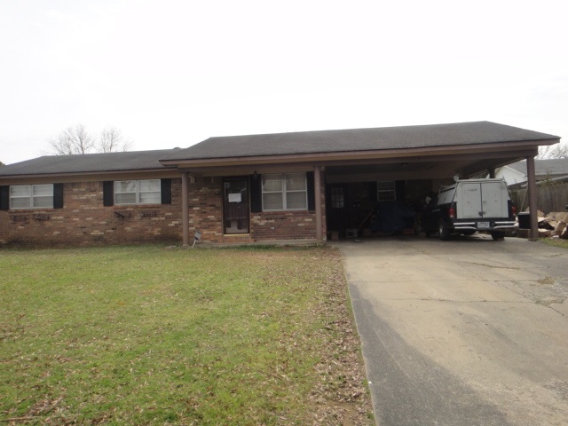 Large lot. 3BR/2BA brick and frame home. Open kitchen/living room area. Great investment opportunity. Exact List price is $65,616.14. PROPERTY IS SOLD "AS IS" AND "WHERE IS" WITH NO WARRANTIES EXPRESSED OR IMPLIED.  See agent remarks