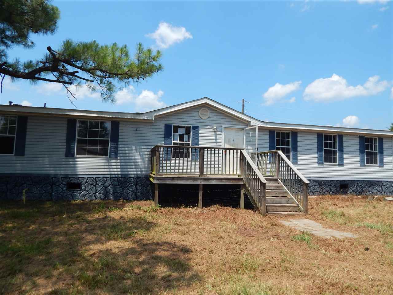 This home needs some work. Large home for a large family. Rural area. Close to Quitman or Clinton.  See agent remarks for details on placing bids on www.hudhomestore.com