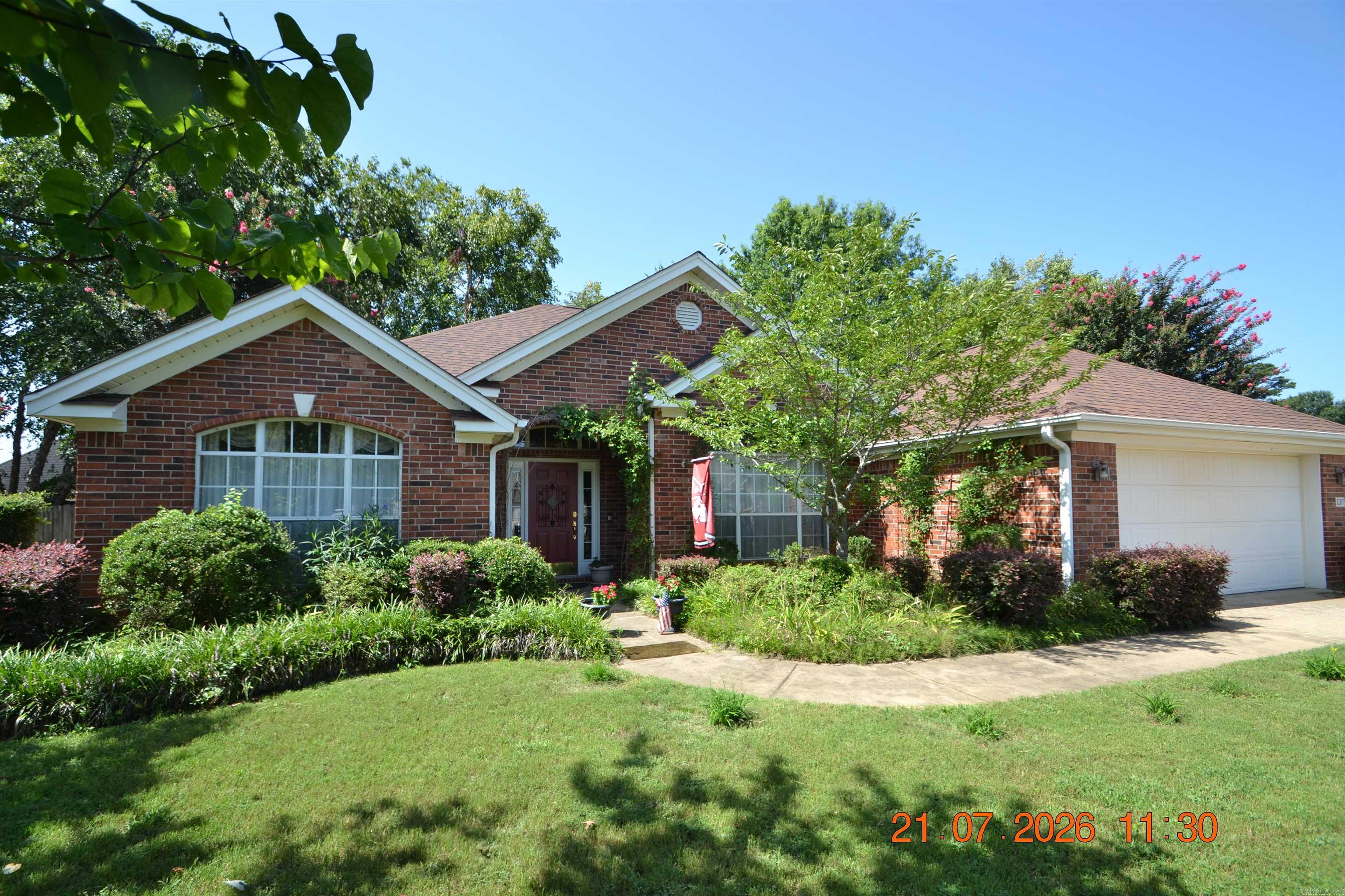 You will fall in love with this lovely home on a quiet cul-de-sac! This is a sought after subdivision that has easy access to the interstate and arterial roads to Benton and Little Rock. Step into the large great room which has a fireplace with gas logs. A separate dining room gives you plenty of room to entertain. A well designed kitchen offers lots of countertop work area and cabinetry. The primary bedroom is separate and has an adjoining bath w/walk-in shower & jetted tub. Several updates include a new microwave, disposal, newer roof and water heater.  The breakfast room overlooks a wonderland of landscaping in the backyard. The seller loved flowers and the yard is filled with perrenials. There is a green house,  a gazebo and a beautiful brick patio. Pictures of the owners' perrenial flowers are included. You will have a burst of color every spring!  See Remarks