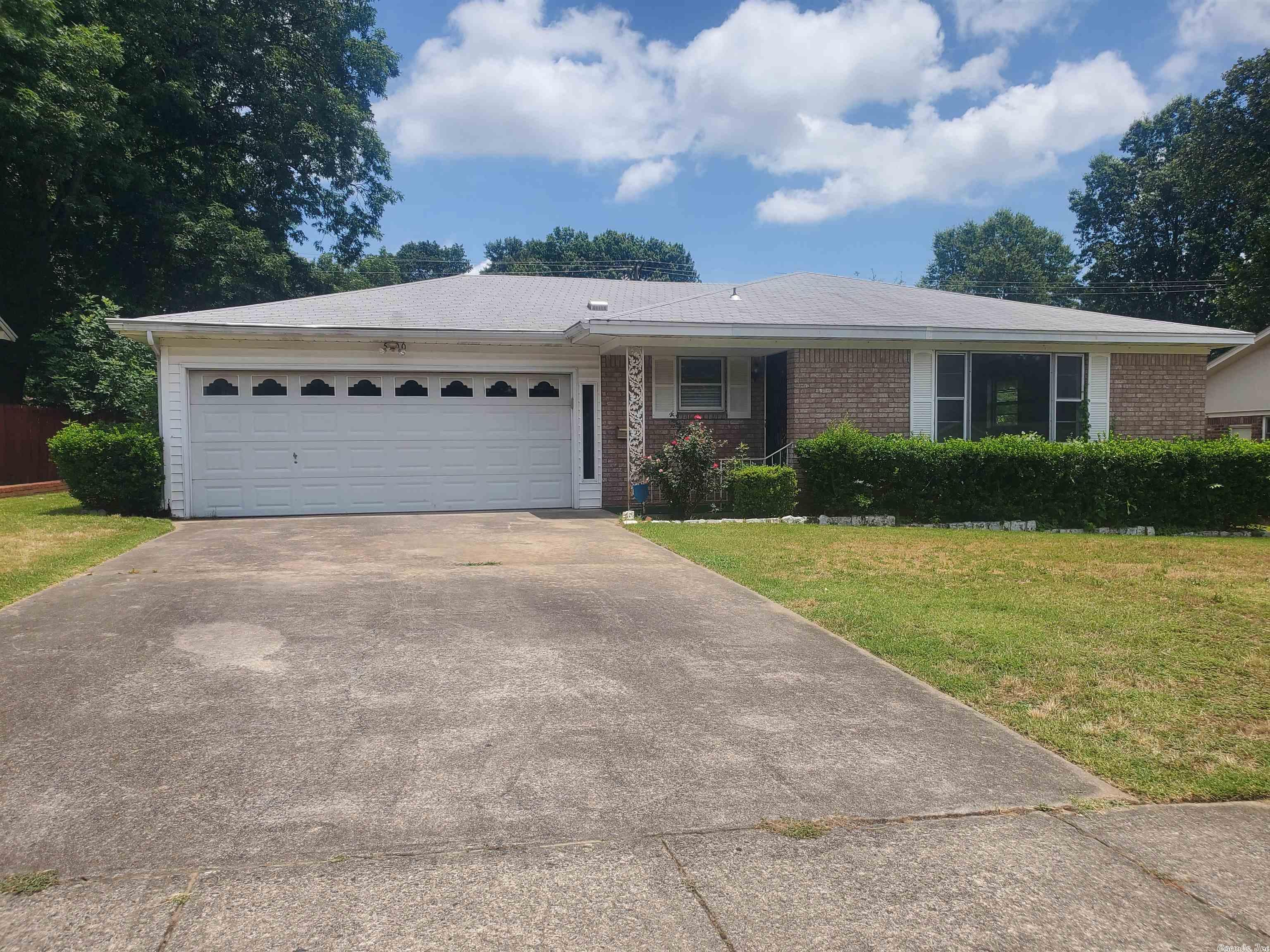 Conveniently located in the heart of Lakewood near shopping, restaurants, Lakewood amenities and walking distance to Crestwood Elementary School. Spacious home with original wood floors, plenty of storage, 3 bedroom 2 bath with huge great room, formal dining and family room off kitchen. SS appliances, quartz countertops and refrigerator conveys. Walk in storage/laundry off family room/covered veranda for easy access. Perfect backyard for entertaining. ALL BRICK solid home with long term homeowners in a great neighborhood. Some updates but needs TLC, SOLD AS IS. Could be a fantastic! See agent remarks!