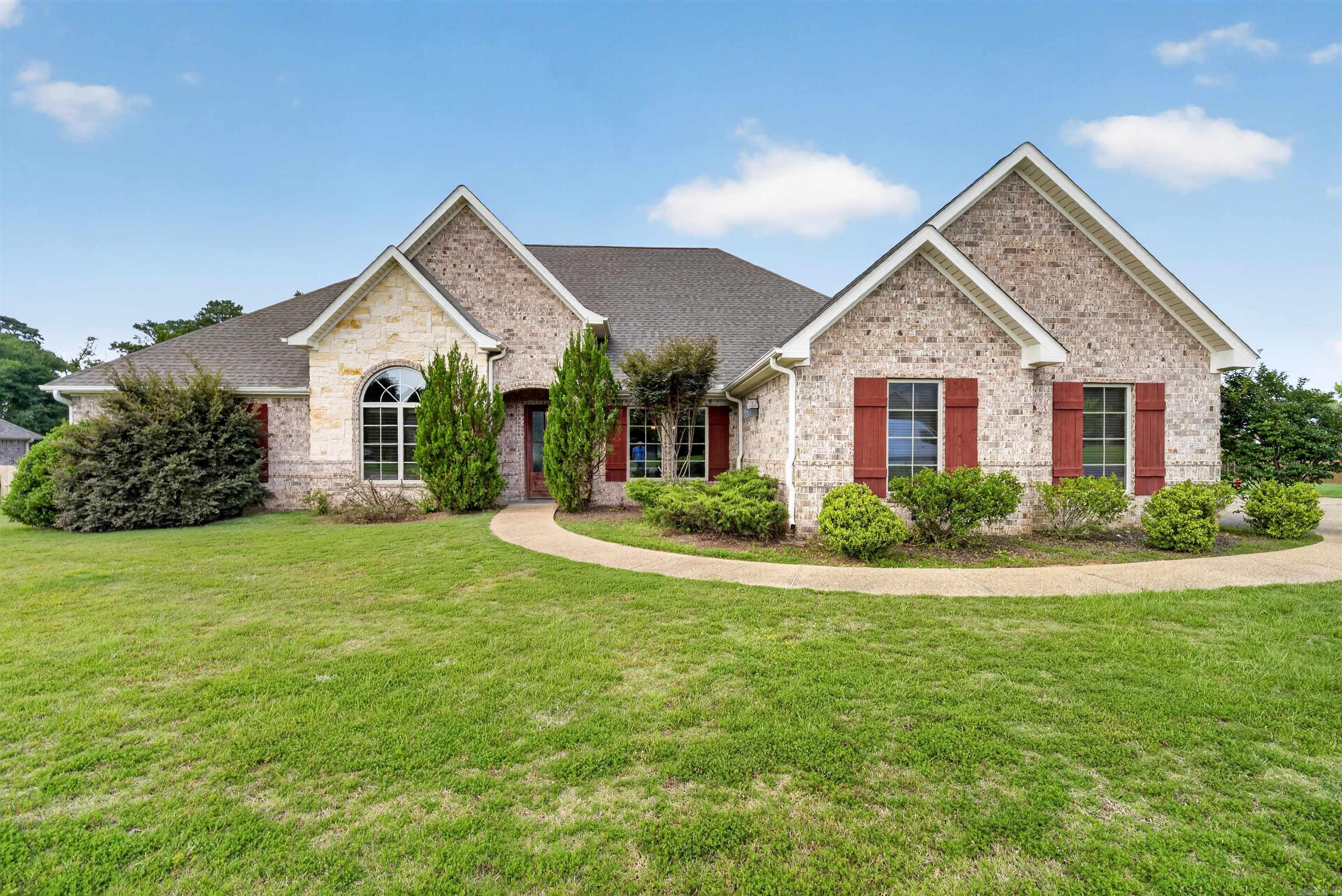 Beautiful custom home located on a spacious corner lot in the desirable Glencairn subdivision of Hot Springs! Offering approximately 3,000 square feet, this thoughtfully designed 4-bedroom, 3-bath home combines comfort, functionality, and quality finishes throughout. The open floor plan features a large great room that flows seamlessly into the chef-inspired kitchen complete with granite countertops, oversized island, custom cabinetry, gas range, double ovens, pantry, breakfast bar, and abundant storage. Separate dining area and dedicated office/study provide additional flexibility for everyday living and entertaining. The spacious primary suite offers a spa-like bath with double vanity, oversized soaking tub, walk-in shower, and large walk-in closet. Additional features include a wood-burning fireplace, built-ins, walk-in closets, laundry room, insulated windows and doors, sprinkler system, guttering, patio area, and a 3-car garage with automatic door opener. Conveniently located near shopping, dining, and Hot Springs amenities while still offering a neighborhood feel. This home has the space, layout, and features buyers are searching for — a must-see!