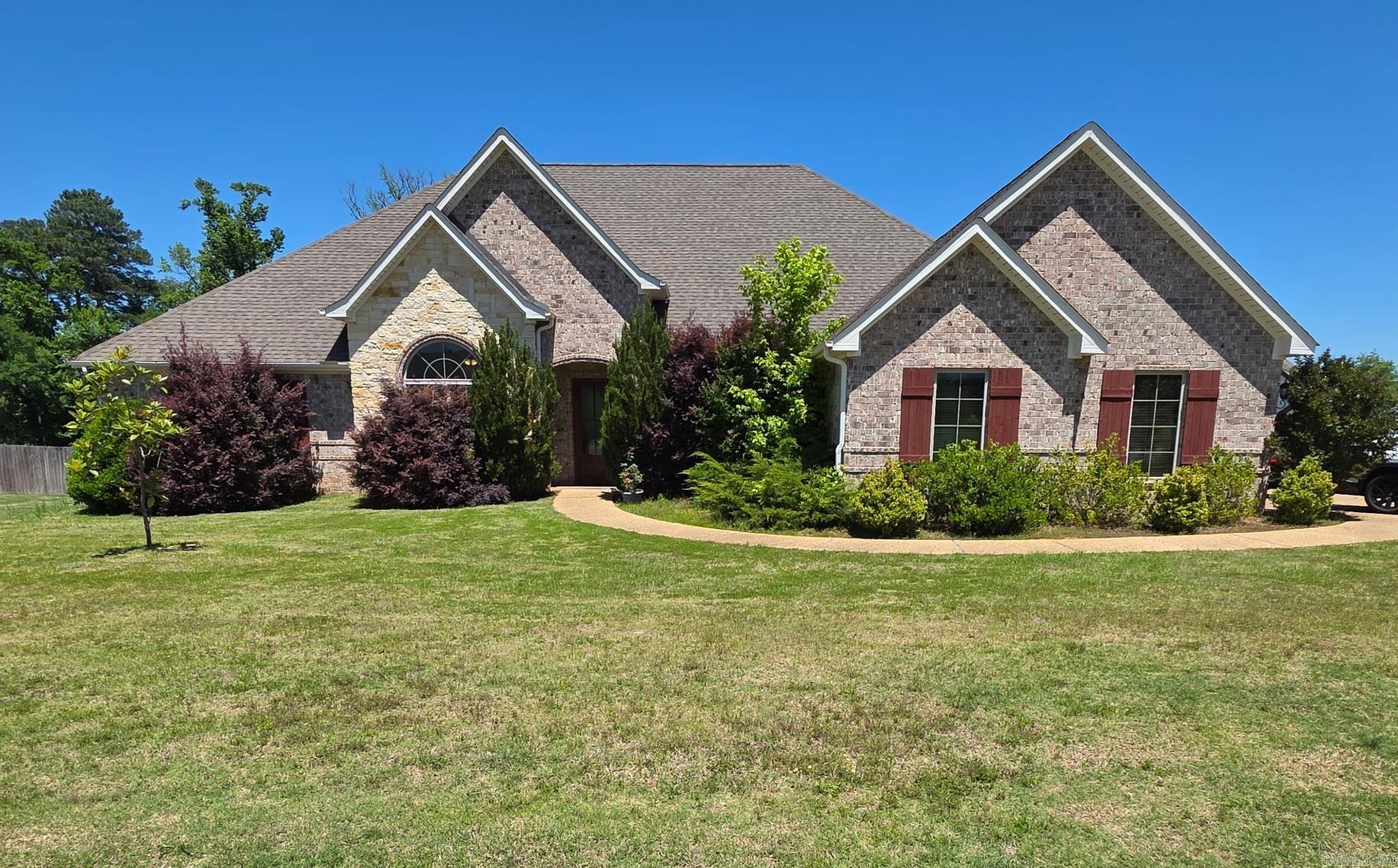 Beautiful custom home located on a spacious corner lot in the desirable Glencairn subdivision of Hot Springs! Offering approximately 3,000 square feet, this thoughtfully designed 4-bedroom, 3-bath home combines comfort, functionality, and quality finishes throughout. The open floor plan features a large great room that flows seamlessly into the chef-inspired kitchen complete with granite countertops, oversized island, custom cabinetry, gas range, double ovens, pantry, breakfast bar, and abundant storage. Separate dining area and dedicated office/study provide additional flexibility for everyday living and entertaining. The spacious primary suite offers a spa-like bath with double vanity, oversized soaking tub, walk-in shower, and large walk-in closet. Additional features include a wood-burning fireplace, built-ins, walk-in closets, laundry room, insulated windows and doors, sprinkler system, guttering, patio area, and a 3-car garage with automatic door opener. Conveniently located near shopping, dining, and Hot Springs amenities while still offering a neighborhood feel. This home has the space, layout, and features buyers are searching for — a must-see!