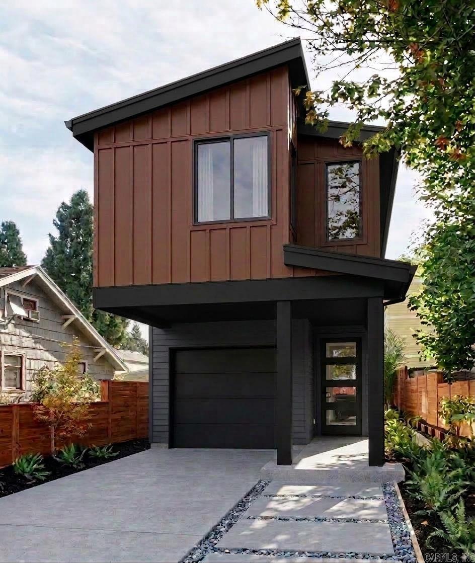 Welcome to 1514 S. Ringo Street — a stunning new construction home where modern design meets everyday livability in one of Little Rock’s most sought-after in-town locations. This 3-bedroom, 2.5-bath home offers 1,387 heated and cooled square feet spread across two beautifully finished levels, thoughtfully designed for the way people actually live. The main level features soaring 9-foot ceilings, an open-concept great room, and a well-appointed kitchen with room for a full refrigerator, dishwasher, and your vision for the perfect finish package. Natural light pours in through oversized windows, and the clean-lined modern exterior makes a statement from the street. Upstairs, retreat to a spacious master suite with a private 5-foot tub/shower combo and walk-in closet. Two additional bedrooms share a full bath, with a convenient half bath on the main level for guests. Every inch of this home has been designed with intention — no wasted space, no builder-grade afterthoughts. Additional highlights include a single car garage with 9-foot ceilings, a thoughtful roof plan with classic 5:12 pitch, and quality construction by EY Custom Homes. New construction. Home warranty included.