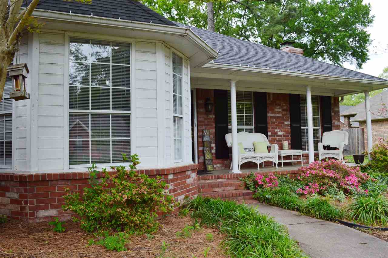 Wonderful family home with four bedrooms, a very livable floor plan and many updates close to the walking trail, schools and shopping.  This home boasts of a new roof in 2014, both HVAC's replaced in 2013, new paint in three rooms in 2013, new laminate flooring (except wet areas) in 2015 (no carpet), replaced master bath countertop and fixtures, hall bath fixtures, previous owner replaced windows, kitchen counter tops replaced in 2009, new garage door and remotes replaced in 2015.