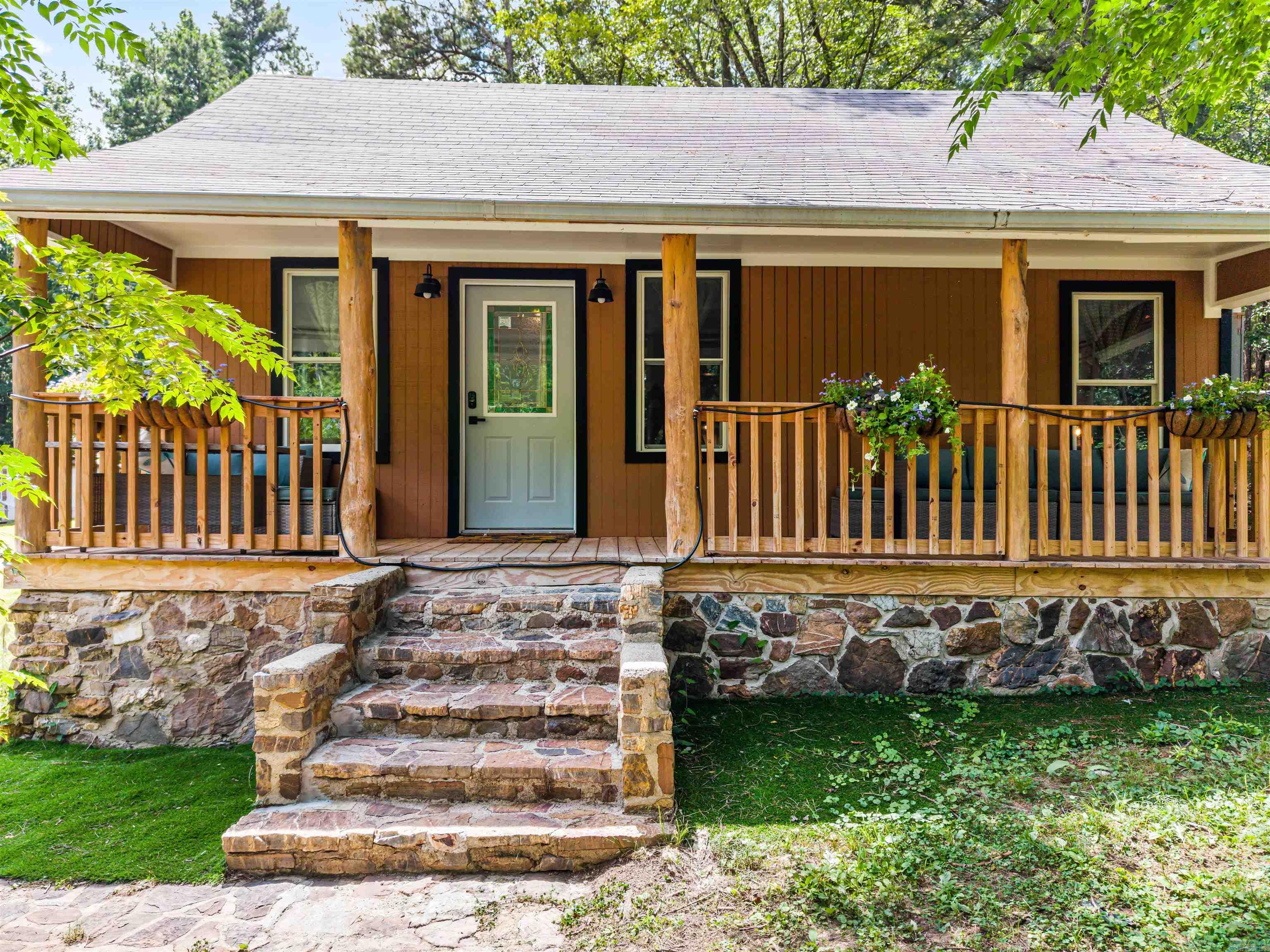 Charming 3 bed 1.5 bath home on 5.6 acres in Fountain Lake School District bordering Arkansas Department of Agriculture Land! Remodeled in 2024! New Roof! New HVAC! New insulated windows! New hot water heater! New Drywall! New plumbing and lighting fixtures! New leathered granite countertops! Storm Room! Big yard for gardening or playing in! Great Location! Won't Last! Call me to schedule your showing today! *Agents Read Remarks