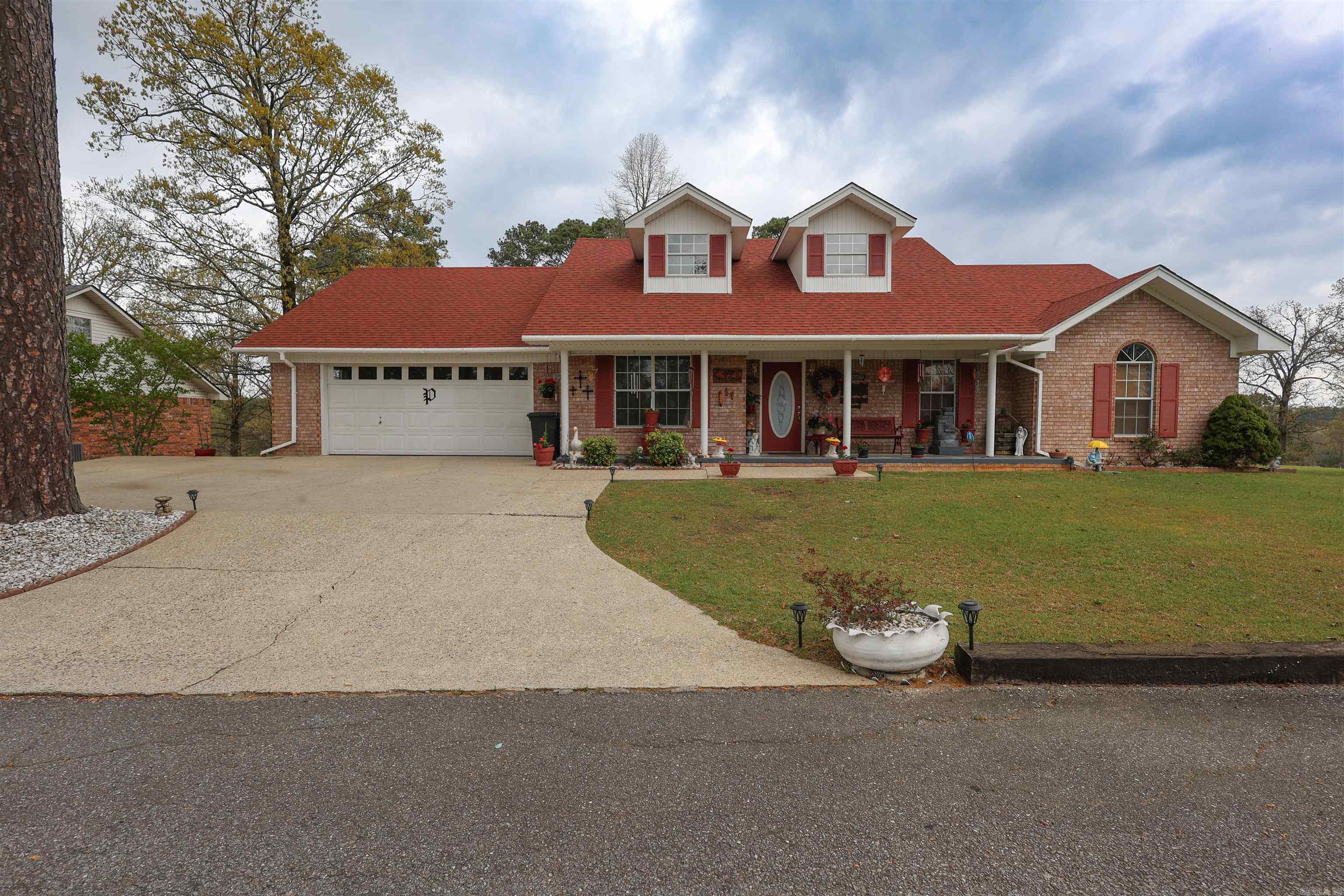 Welcome to this well-maintained brick home located in the Davis Subdivision—one of Glenwood’s established in-town neighborhoods offering a convenient location with a residential setting. Situated on approximately 0.5 acres, this 3-bedroom, 2.5-bath home offers 2,173 square feet of comfortable living space with a functional layout designed for everyday living.  The property features an attached garage along with an additional carport, providing ample covered parking. Outside, you’ll also find a storage building for added utility. Enjoy scenic surroundings and elevated views that add to the overall appeal of this property. With its combination of space, location, and practical features, this home presents a great opportunity within the Glenwood city limits.