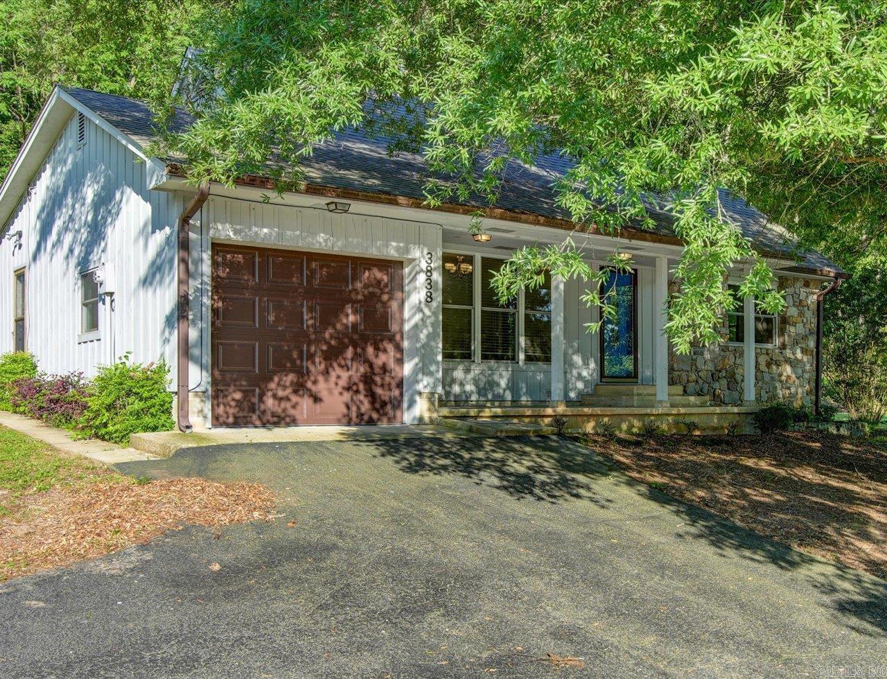 Welcome to this 4-bedroom, 2-bath home, situated just minutes from the beautiful Lake Ouachita State Park & Marina. This move-in ready gem has new flooring, fresh paint, a new roof, and a brand new HVAC system.    Located just 25 minutes from downtown Hot Springs, with convenient access to city amenities and Oaklawn Racing and Casino.    This property also presents a great vacation home or short-term rental opportunity with it's close proximity to the lake!  The outdoor space provides plenty of room for relaxation and recreation, including a great yard for a large garden.