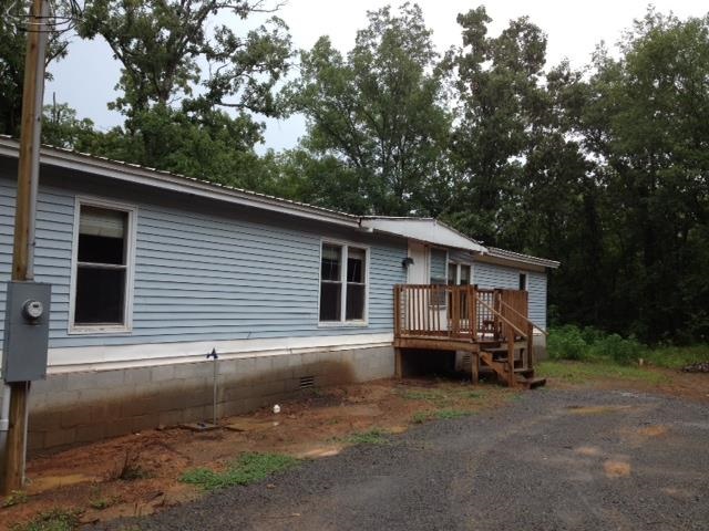 Beautiful 6.50 acres with trees. Mobile Home needs some work.